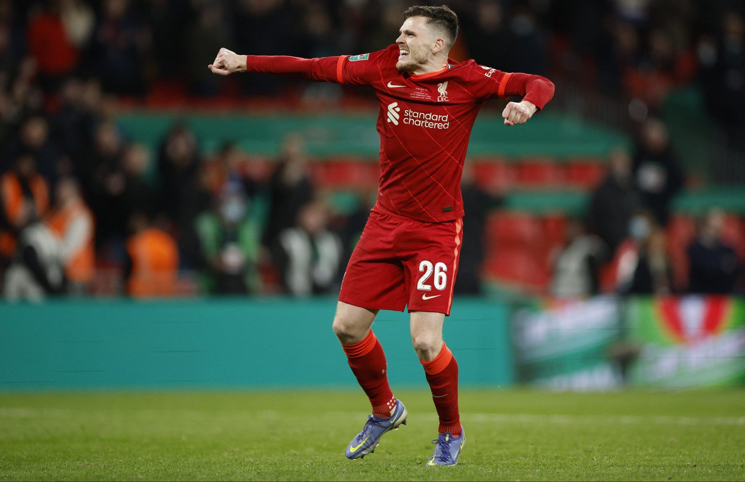 Soccer Football - Carabao Cup Final - Chelsea v Liverpool - Wembley Stadium, London, Britain - February  27, 2022  Liverpool's Andrew Robertson reacts after he scores a penalty during the shoot-out Action Images via Reuters/John Sibley