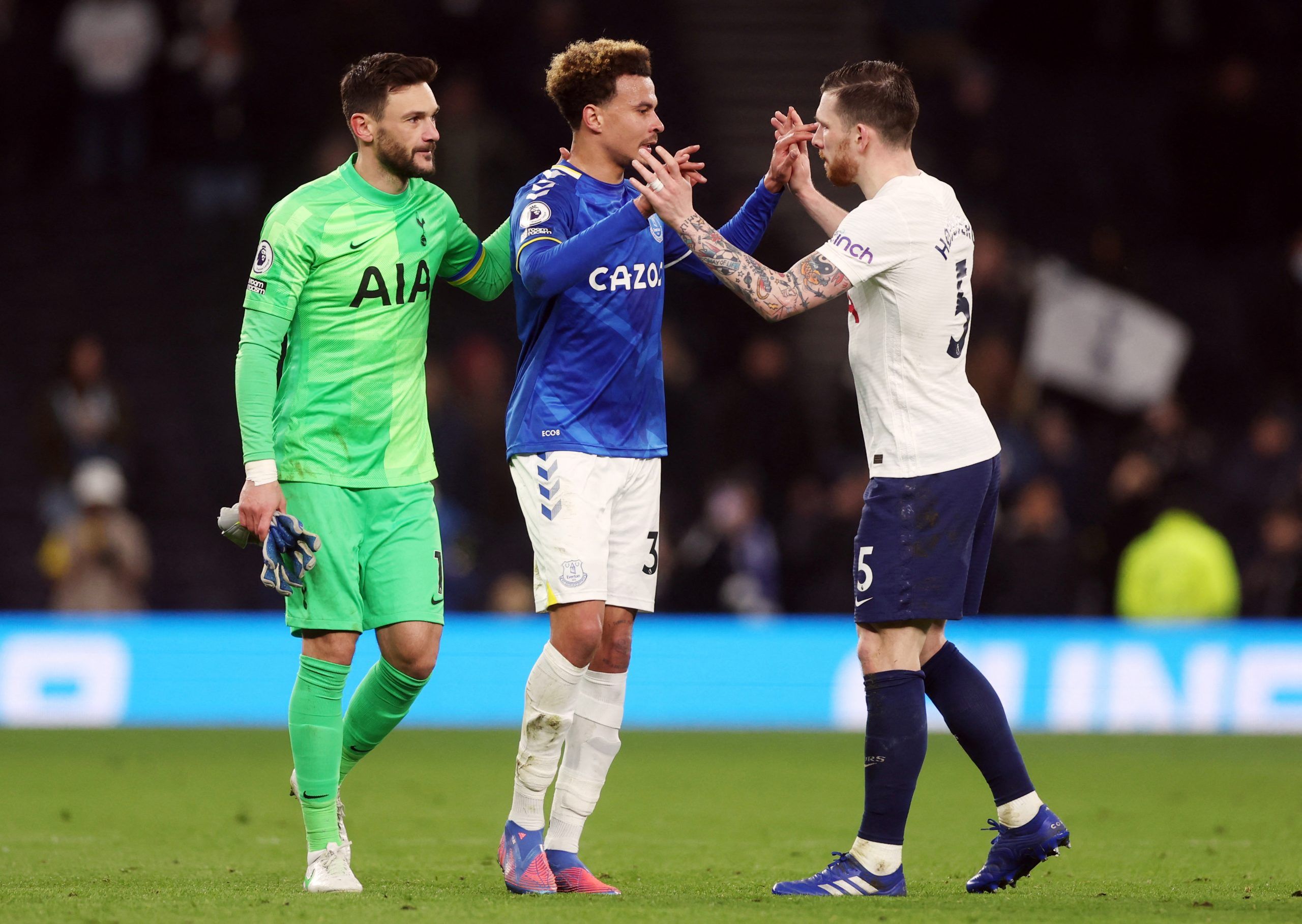 Soccer Football - Premier League - Tottenham Hotspur v Everton - Tottenham Hotspur Stadium, London, Britain - March 7, 2022 Everton's Dele Alli with Tottenham Hotspur's Hugo Lloris and Pierre-Emile Hojbjerg after the match Action Images via Reuters/Matthew Childs EDITORIAL USE ONLY. No use with unauthorized audio, video, data, fixture lists, club/league logos or 'live' services. Online in-match use limited to 75 images, no video emulation. No use in betting, games or single club /league/player p