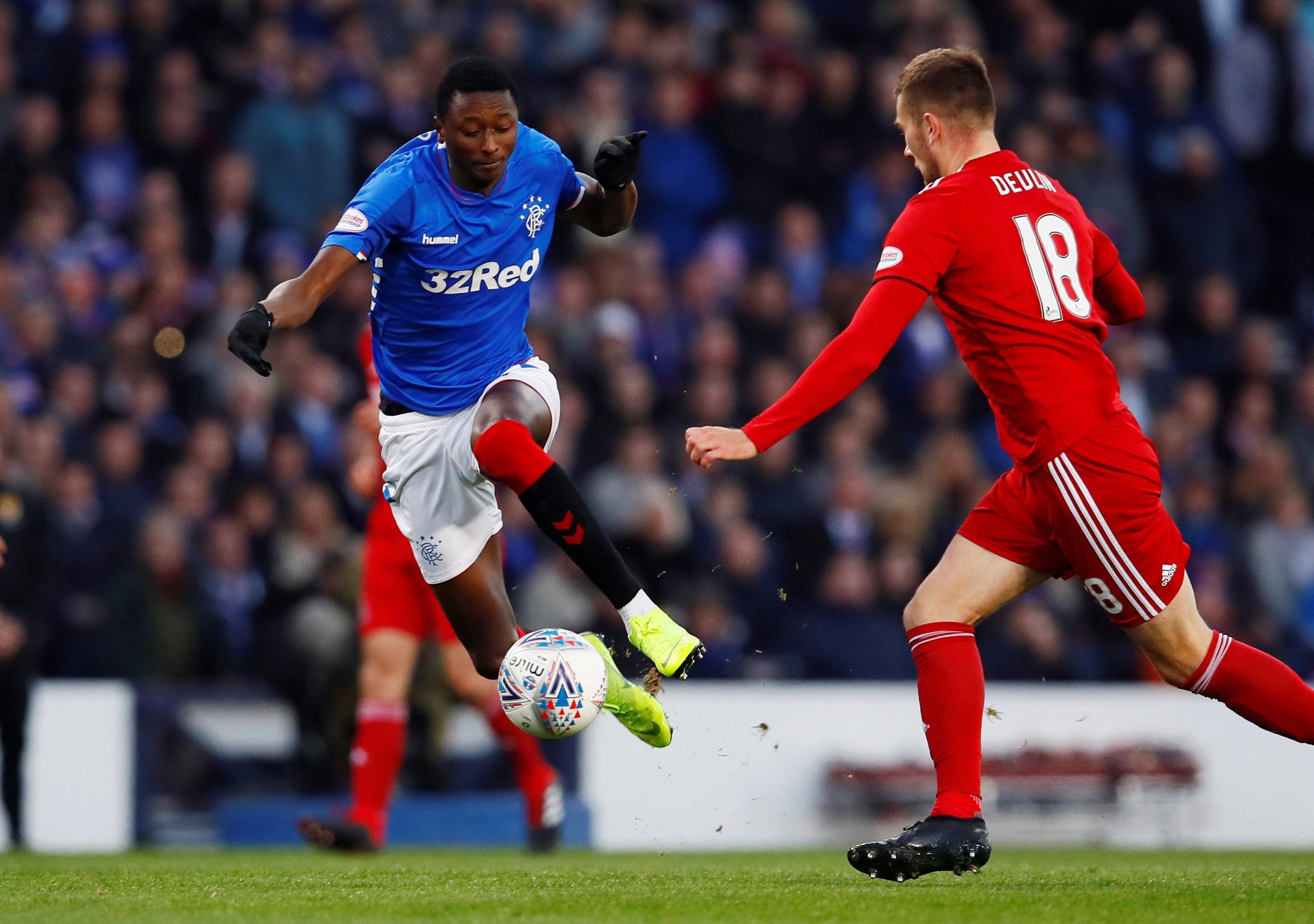Soccer Football - Scottish League Cup Semi Final - Aberdeen v Rangers - Hampden Park, Glasgow, Britain - October 28, 2018  Rangers' Sadiq Umar in action with Aberdeen's Michael Devlin          Action Images via Reuters/Jason Cairnduff  EDITORIAL USE ONLY. No use with unauthorized audio, video, data, fixture lists, club/league logos or 