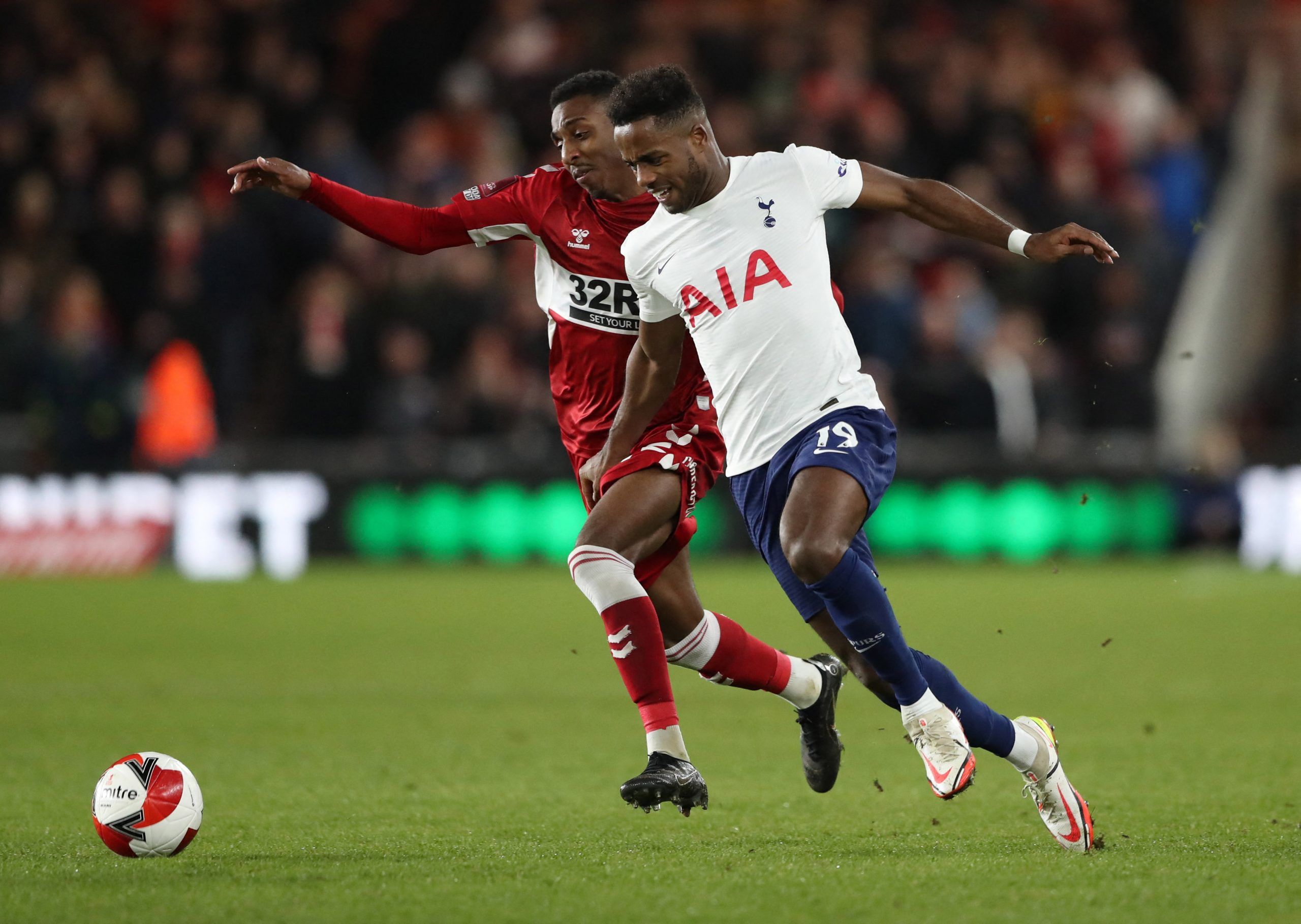 Soccer Football - FA Cup Fifth Round - Middlesbrough v Tottenham Hotspur - Riverside Stadium, Middlesbrough, Britain - March 1, 2022 Tottenham Hotspur's Ryan Sessegnon in action with Middlesbrough's Isaiah Jones REUTERS/Scott Heppell