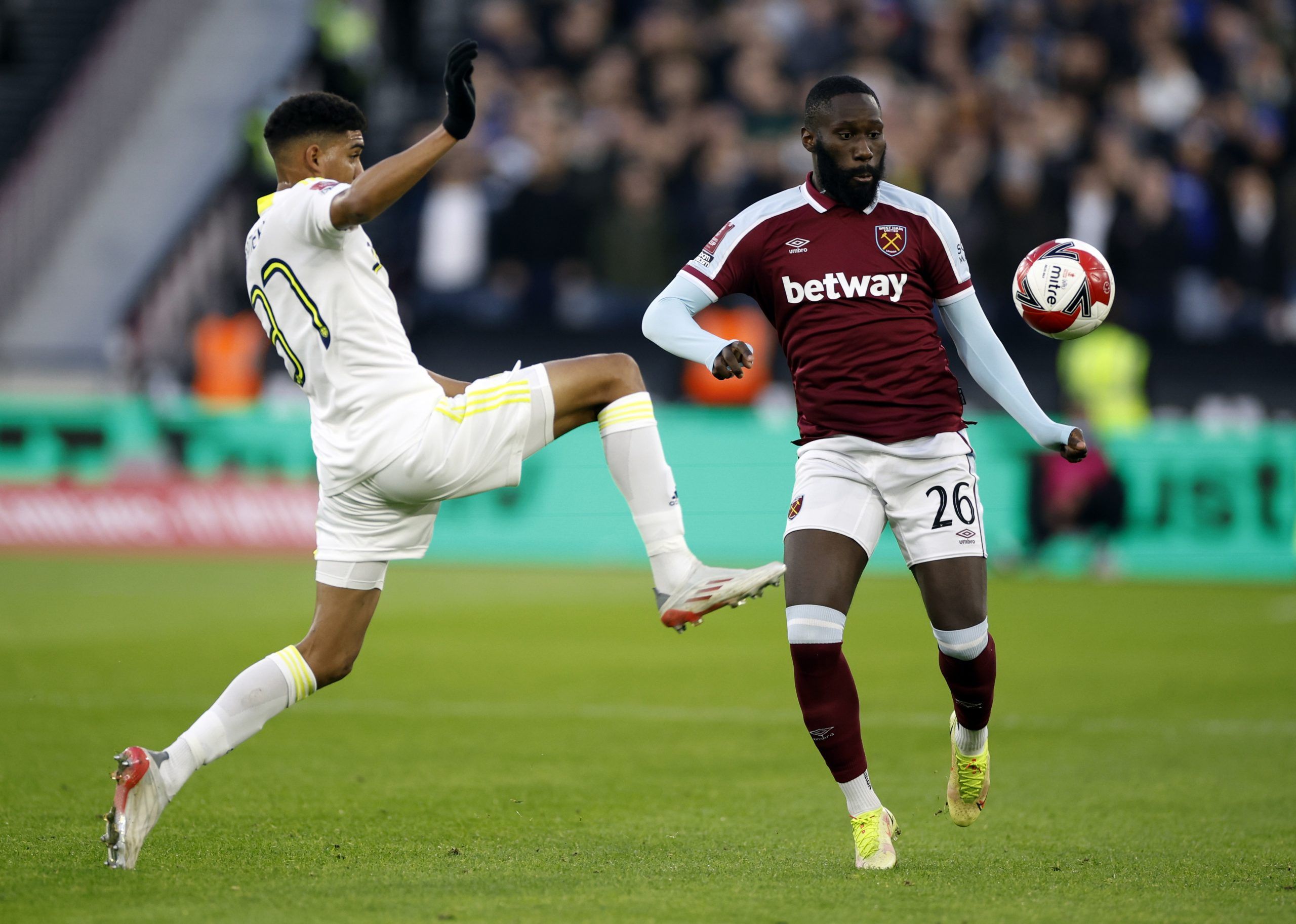 Soccer Football - FA Cup Third Round - West Ham United v Leeds United - London Stadium, London, Britain - January 9, 2022 West Ham United's Arthur Masuaku in action with Leeds United's Cody Drameh Action Images via Reuters/John Sibley