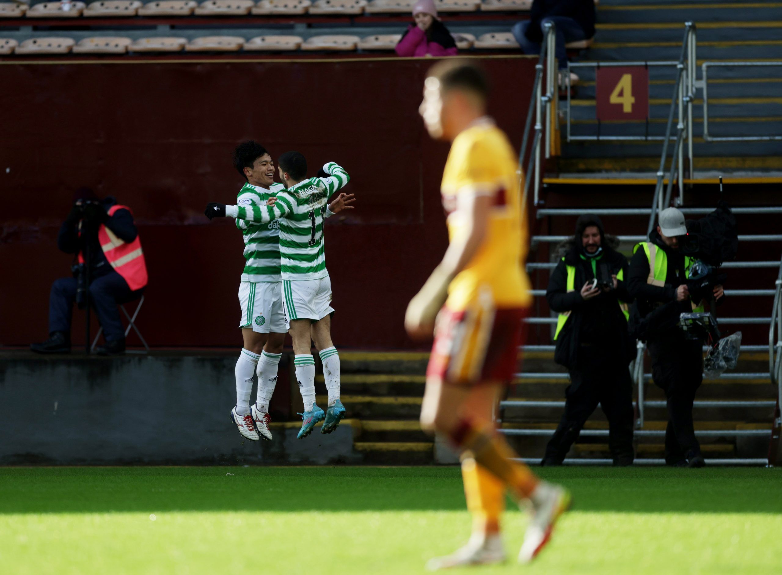 Soccer Football - Scottish Premiership - Motherwell v Celtic - Fir Park, Motherwell, Scotland, Britain - February 6, 2022 Celtic's Liel Abada celebrates scoring their first goal with Reo Hatate Action Images via Reuters/Lee Smith