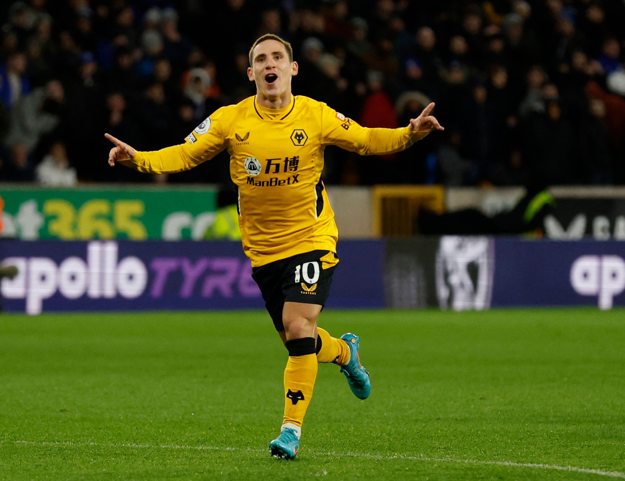 Soccer Football - Premier League - Wolverhampton Wanderers v Leicester City - Molineux Stadium, Wolverhampton, Britain - February 20, 2022 Wolverhampton Wanderers' Daniel Podence celebrates scoring their second goal Action Images via Reuters/Jason Cairnduff EDITORIAL USE ONLY. No use with unauthorized audio, video, data, fixture lists, club/league logos or 'live' services. Online in-match use limited to 75 images, no video emulation. No use in betting, games or single club /league/player publica