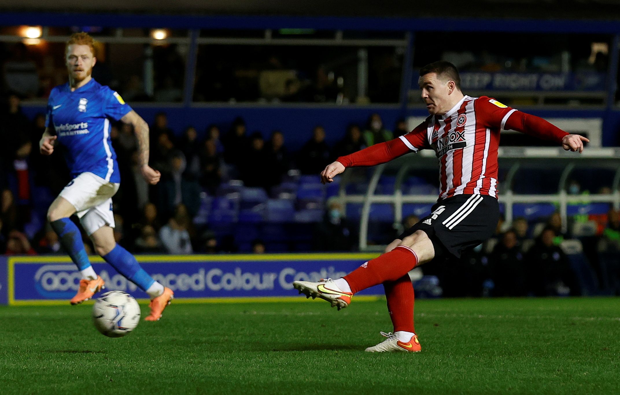 Soccer Football - Championship - Birmingham City v Sheffield United - St Andrew's, Birmingham, Britain - February 4, 2022 Sheffield United's John Fleck shoots at goal   Action Images/Jason Cairnduff  EDITORIAL USE ONLY. No use with unauthorized audio, video, data, fixture lists, club/league logos or 'live' services. Online in-match use limited to 75 images, no video emulation. No use in betting, games or single club /league/player publications. Please contact your account representative for furt