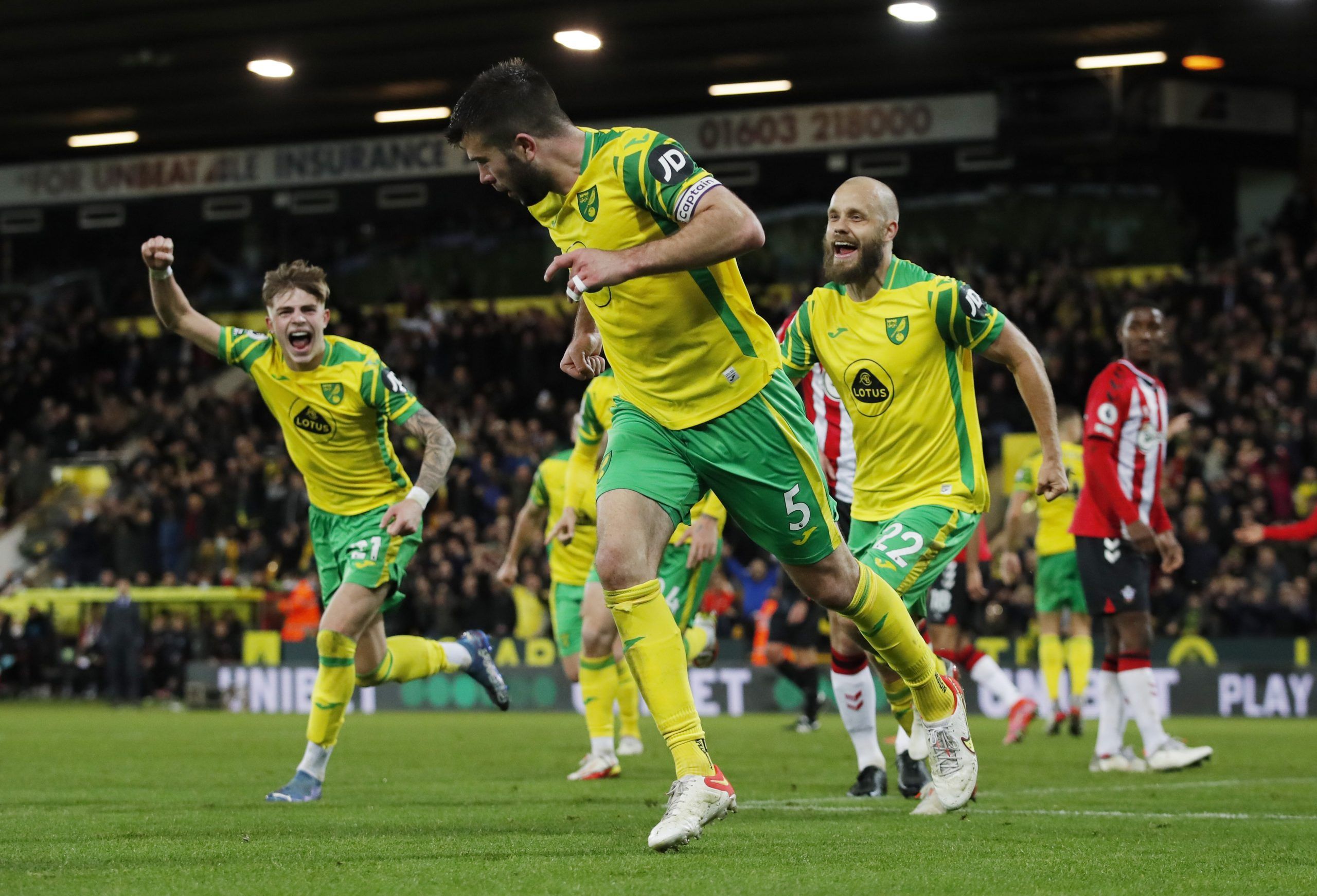Soccer Football - Premier League - Norwich City v Southampton - Carrow Road, Norwich, Britain - November 20, 2021 Norwich City's Grant Hanley celebrates scoring their second goal with teammates Action Images via Reuters/Andrew Couldridge EDITORIAL USE ONLY. No use with unauthorized audio, video, data, fixture lists, club/league logos or 'live' services. Online in-match use limited to 75 images, no video emulation. No use in betting, games or single club /league/player publications.  Please conta