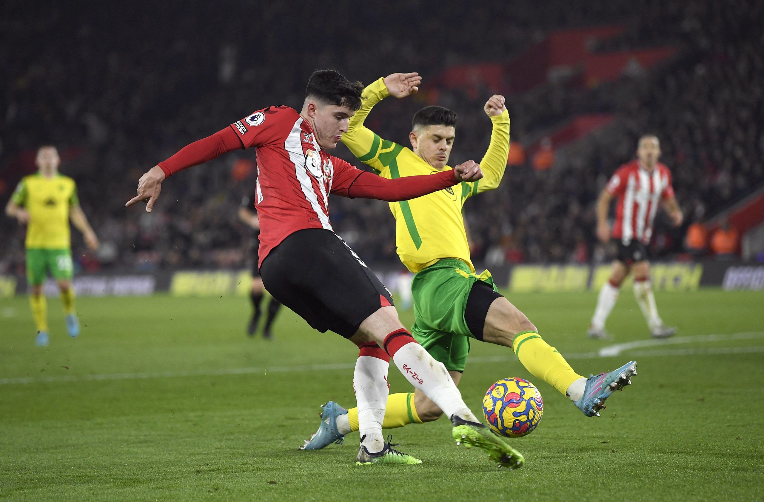 Soccer Football - Premier League - Southampton v Norwich City - St Mary's Stadium, Southampton, Britain - February 25, 2022 Southampton's Tino Livramento in action with Norwich City's Milot Rashica REUTERS/Tony Obrien EDITORIAL USE ONLY. No use with unauthorized audio, video, data, fixture lists, club/league logos or 'live' services. Online in-match use limited to 75 images, no video emulation. No use in betting, games or single club /league/player publications.  Please contact your account repr