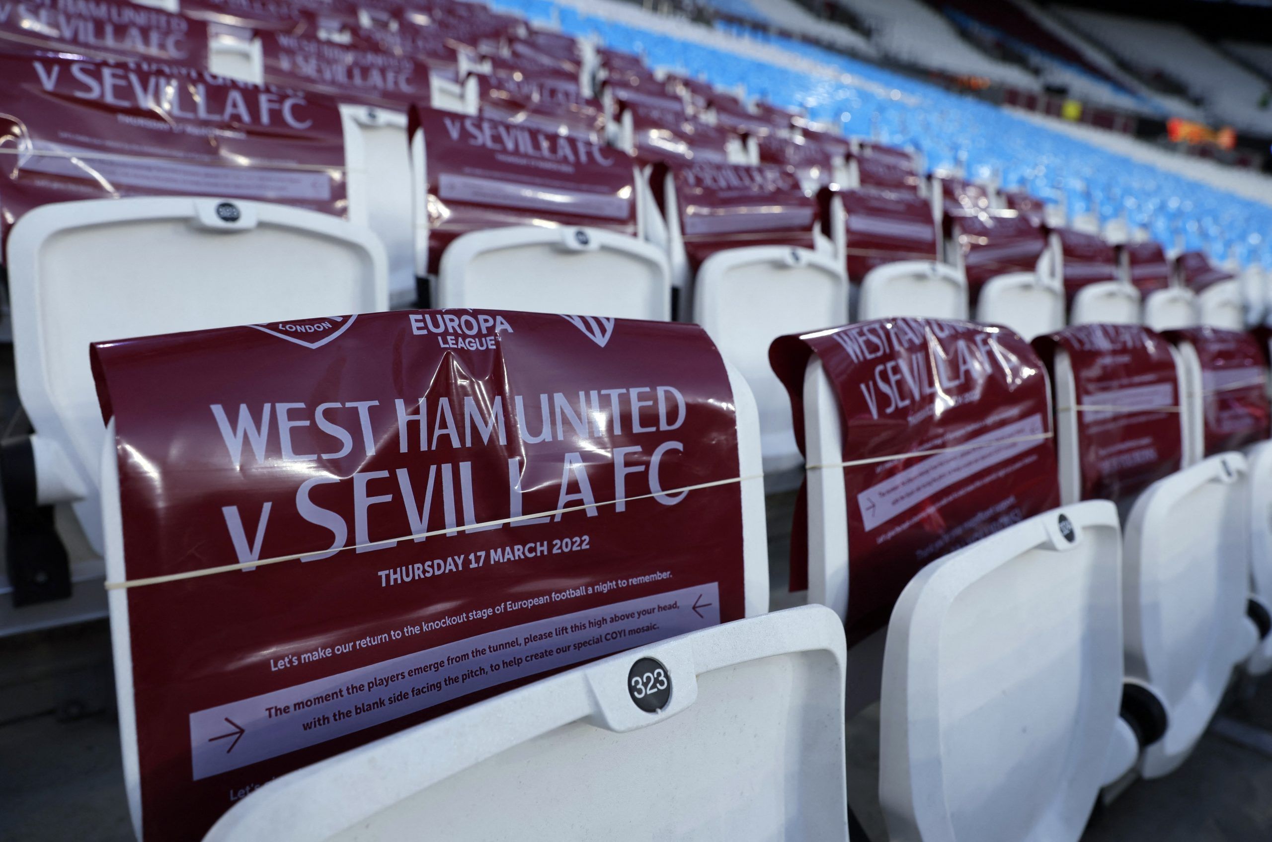 Soccer Football - Europa League - Round of 16 Second Leg - West Ham United v Sevilla - London Stadium, London, Britain - March 17, 2022  General view of banners on the seats inside the stadium before the match Action Images via Reuters/Andrew Couldridge