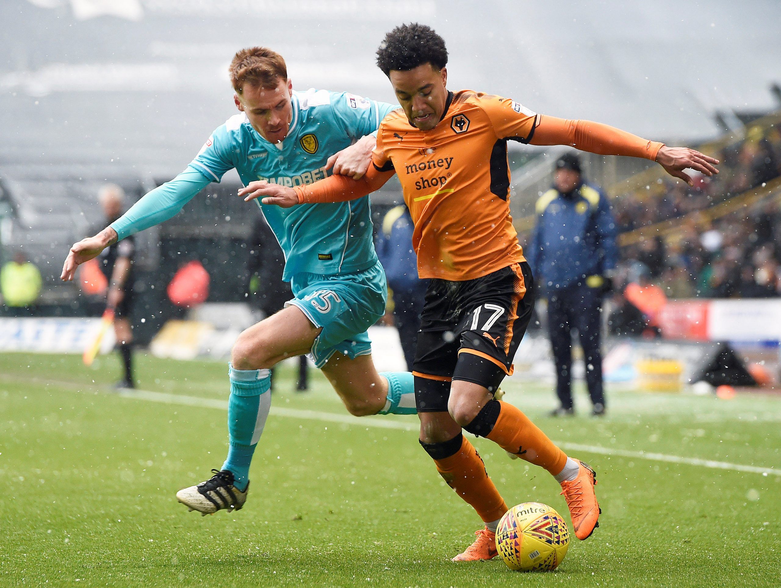 Soccer Football - Championship - Wolverhampton Wanderers vs Burton Albion - Molineux Stadium, Wolverhampton, Britain - March 17, 2018  Wolves' Helder Costa in action with Burton's Tom Naylor     Action Images/Alan Walter  EDITORIAL USE ONLY. No use with unauthorized audio, video, data, fixture lists, club/league logos or 