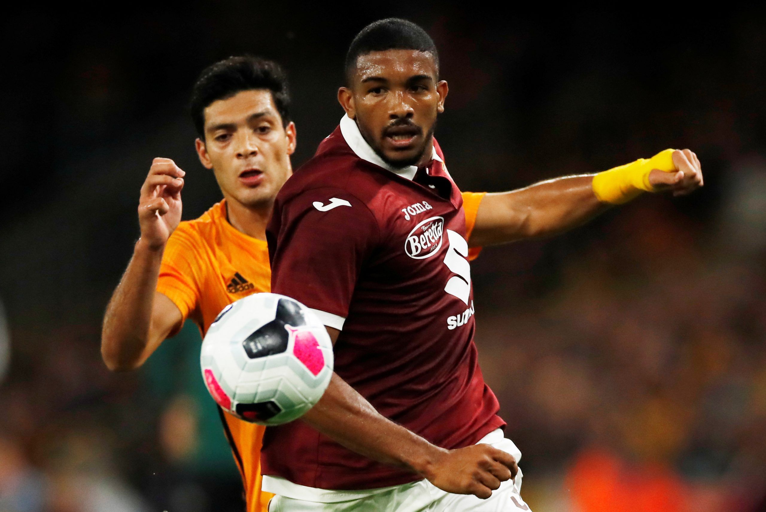 Soccer Football - Europa League - Playoffs - Second Leg - Wolverhampton Wanderers v Torino - Molineux Stadium, Wolverhampton, Britain - August 29, 2019   Wolverhampton Wanderers' Raul Jimenez in action with Torino's Gleison Bremer       Action Images via Reuters/Andrew Boyers