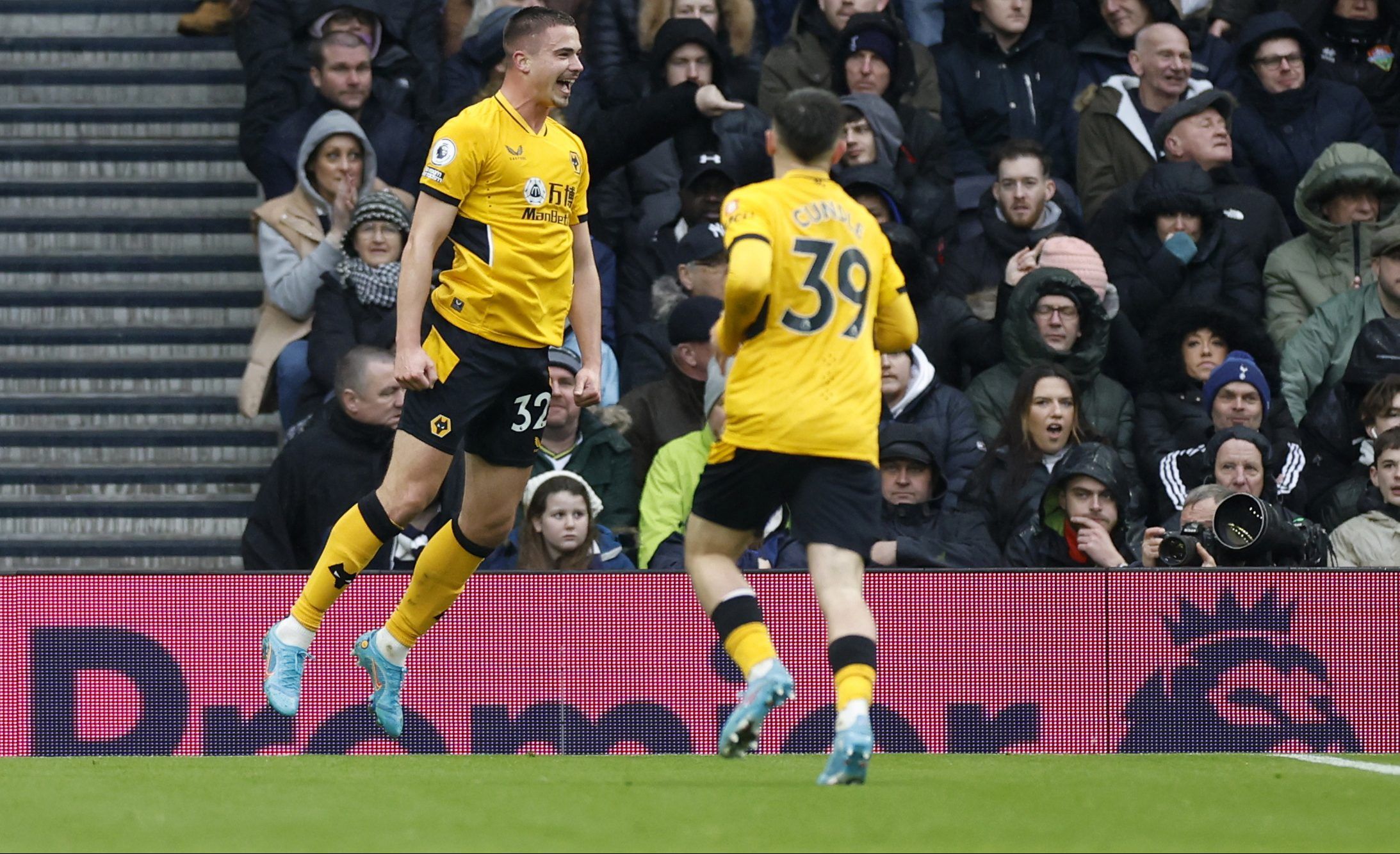 Wolverhampton Wanderers' Leander Dendoncker celebrates scoring their second goal with Luke CundleSoccer Football - Premier League - Tottenham Hotspur v Wolverhampton Wanderers - Tottenham Hotspur Stadium, London, Britain - February 13, 2022 Wolverhampton Wanderers' Leander Dendoncker celebrates scoring their second goal with Luke Cundle Action Images via Reuters/Peter Cziborra EDITORIAL USE ONLY. No use with unauthorized audio, video, data, fixture lists, club/league logos or 'live' services. On