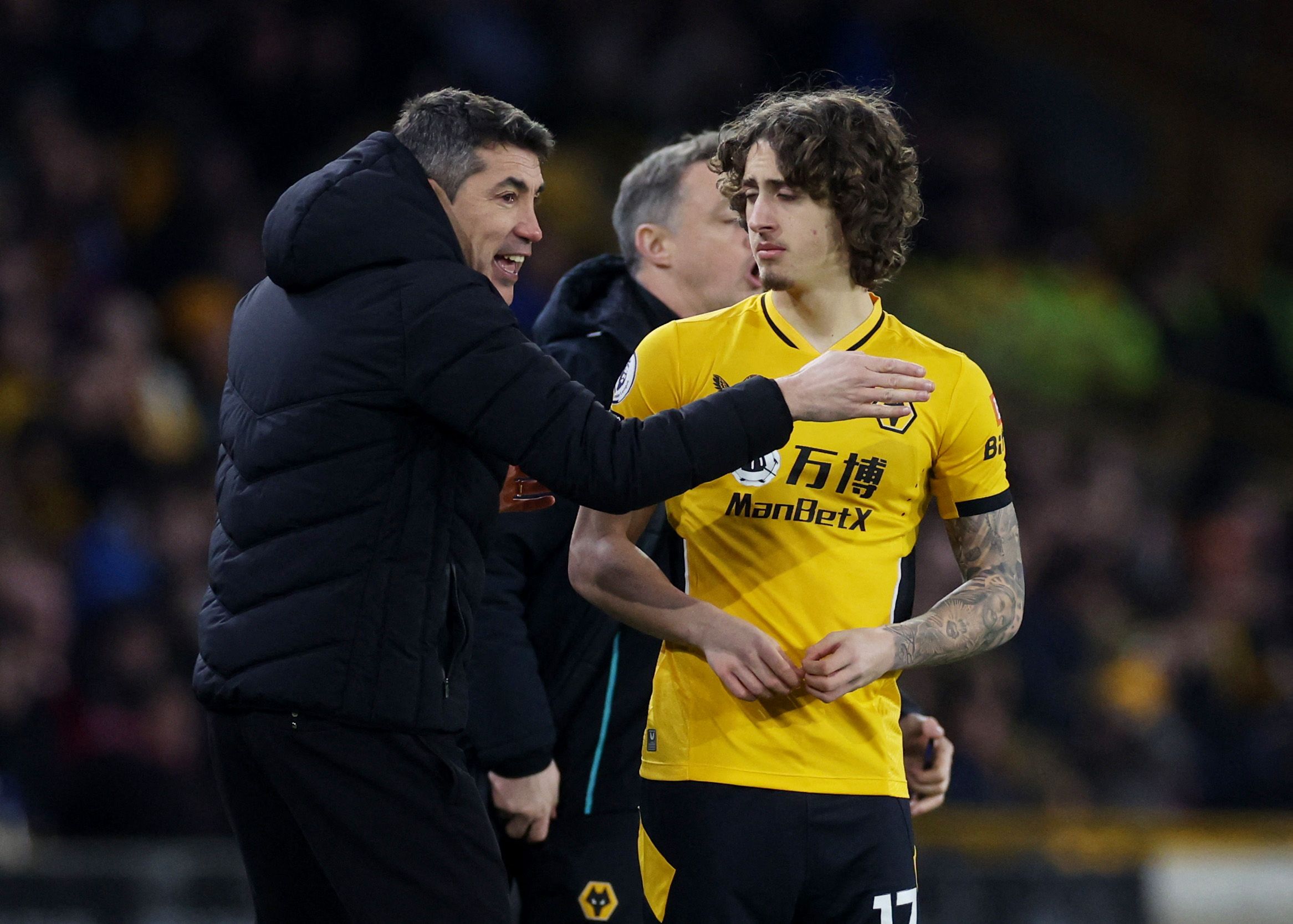Soccer Football - Premier League - Wolverhampton Wanderers v Watford - Molineux Stadium, Wolverhampton, Britain - March 10, 2022 Wolverhampton Wanderers manager Bruno Lage prepares to substitute on Wolverhampton Wanderers' Fabio Silva Action Images via Reuters/Paul Childs EDITORIAL USE ONLY. No use with unauthorized audio, video, data, fixture lists, club/league logos or 'live' services. Online in-match use limited to 75 images, no video emulation. No use in betting, games or single club /league