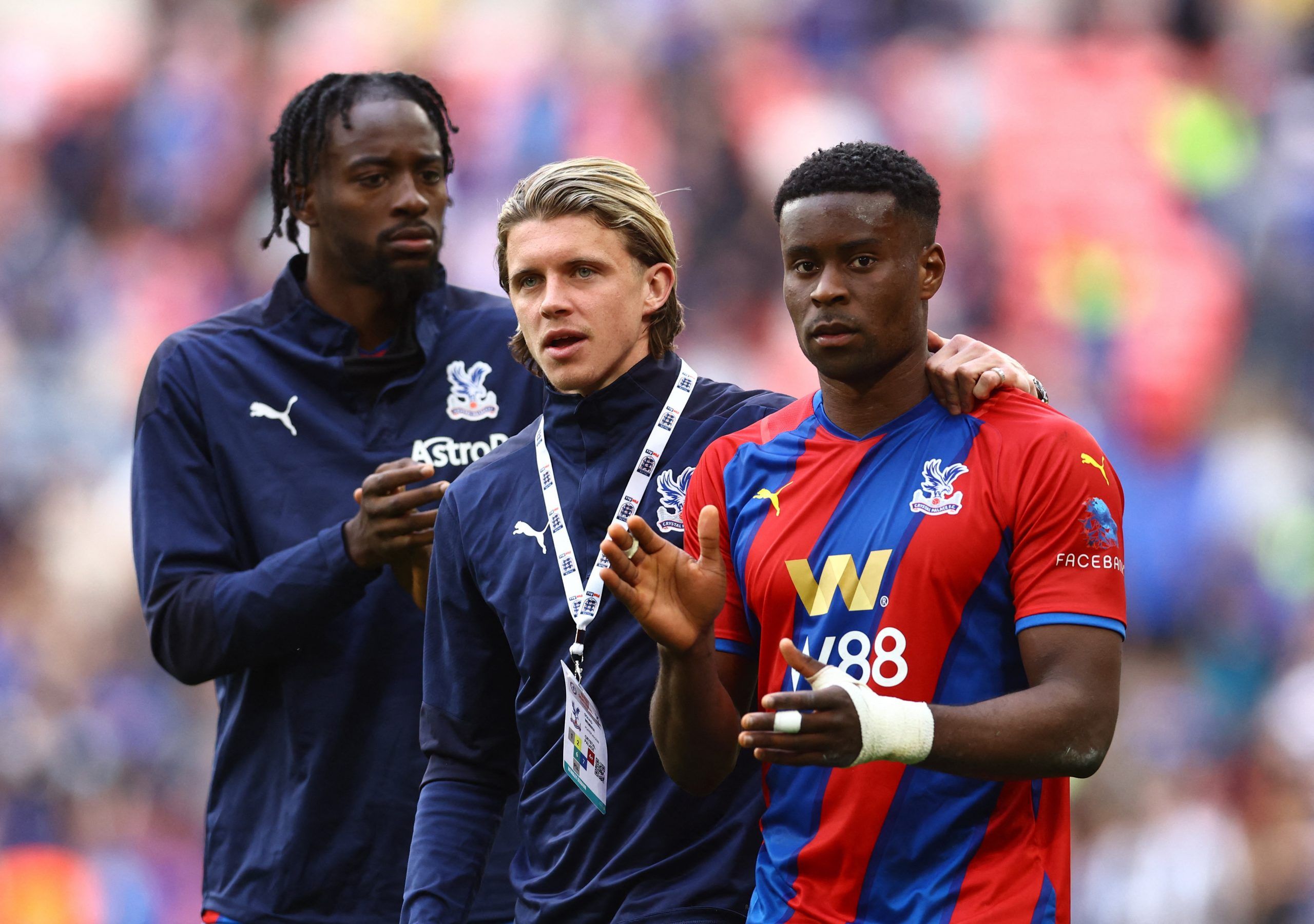Soccer Football - FA Cup Semi Final - Chelsea v Crystal Palace - Wembley Stadium, London, Britain - April 17, 2022 Crystal Palace's Marc Guehi, Conor Gallagher and Jean-Philippe Mateta after the match REUTERS/David Klein