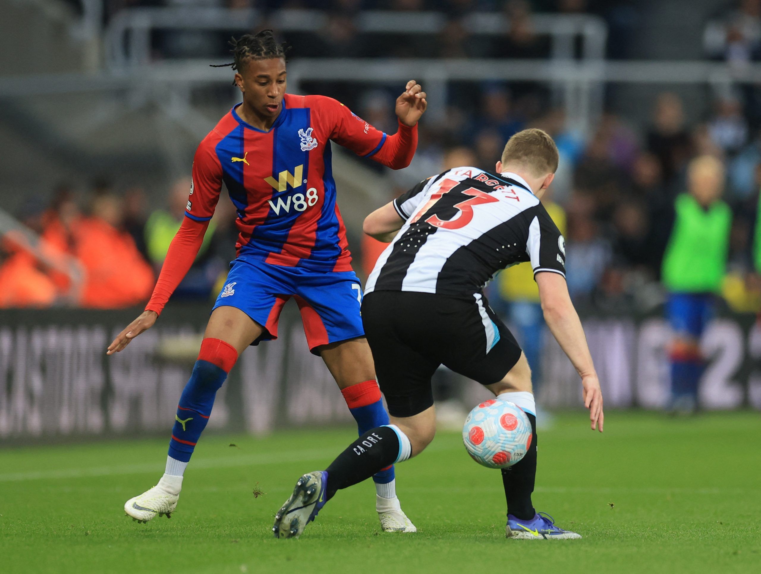 Crystal Palace's Michael Olise in action with Newcastle United's Matt TargettSoccer Football - Premier League - Newcastle United v Crystal Palace - St James' Park, Newcastle, Britain - April 20, 2022 Crystal Palace's Michael Olise in action with Newcastle United's Matt Targett Action Images via Reuters/Lee Smith EDITORIAL USE ONLY. No use with unauthorized audio, video, data, fixture lists, club/league logos or 'live' services. Online in-match use limited to 75 images, no video emulation. No use