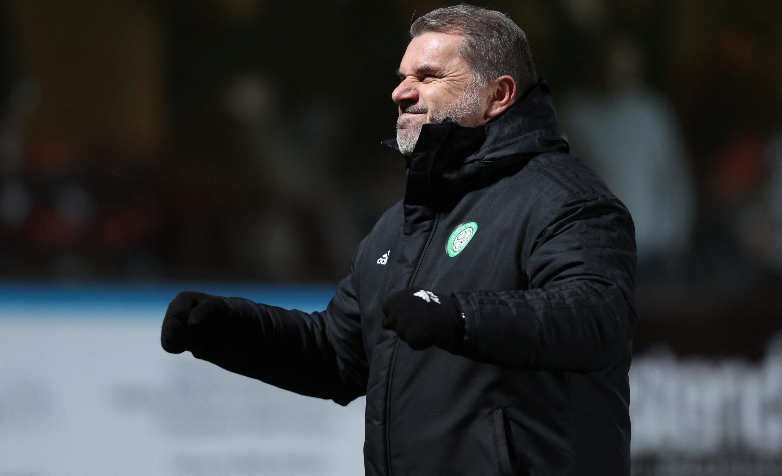 Soccer Football - Scottish Cup Quarter Final - Dundee United v Celtic - Dens Park, Dundee, Scotland, Britain - March 14, 2022 Celtic manager Ange Postecoglou celebrates after the match REUTERS/Russell Cheyne
