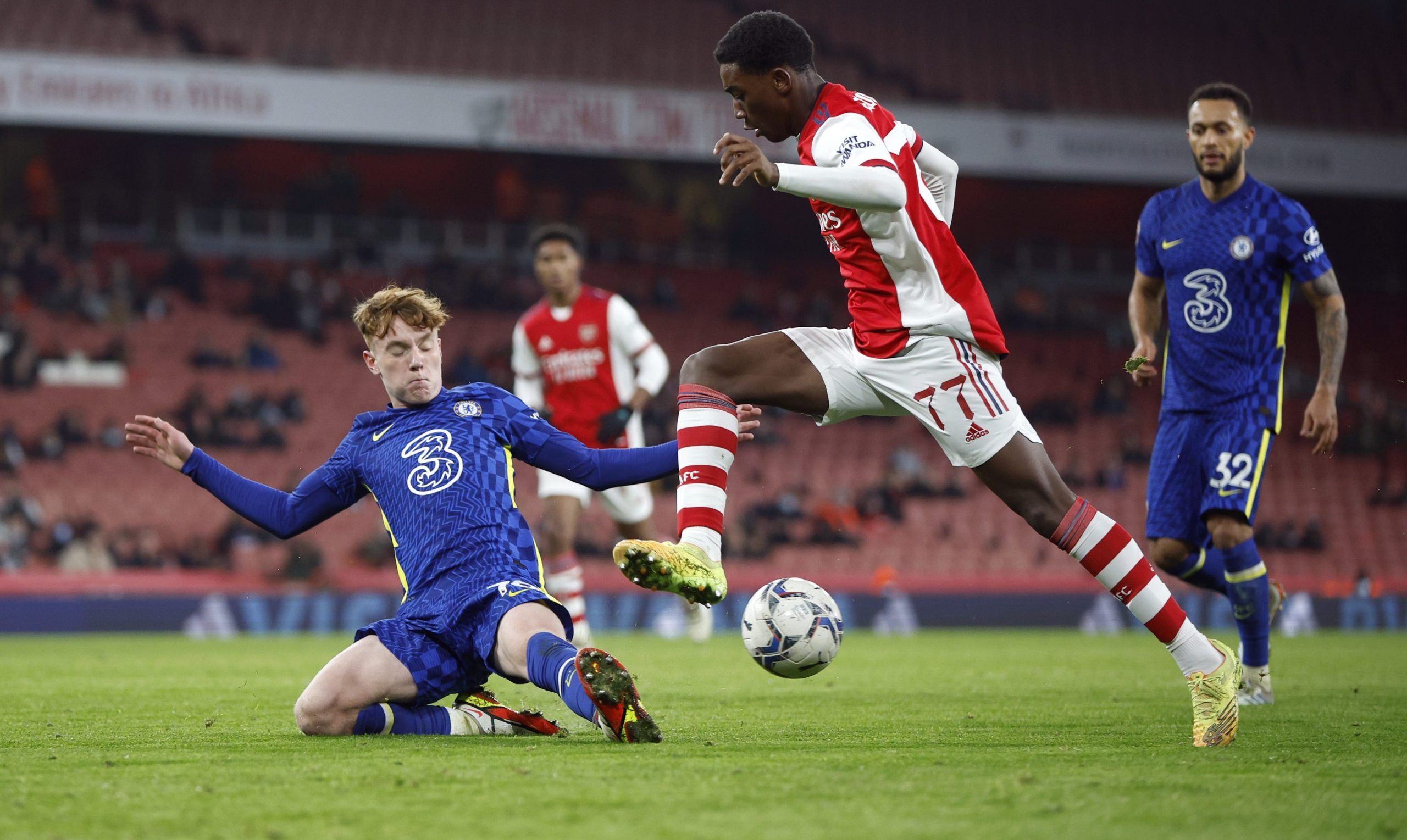 Soccer Football - EFL Trophy - Arsenal U21 v Chelsea U21 - Emirates Stadium, London, Britain - January 11, 2022 Arsenal U21's Khayon Edwards in action with Chelsea U21's Brodi Hughes Action Images/John Sibley EDITORIAL USE ONLY. No use with unauthorized audio, video, data, fixture lists, club/league logos or 'live' services. Online in-match use limited to 75 images, no video emulation. No use in betting, games or single club /league/player publications.  Please contact your account representativ