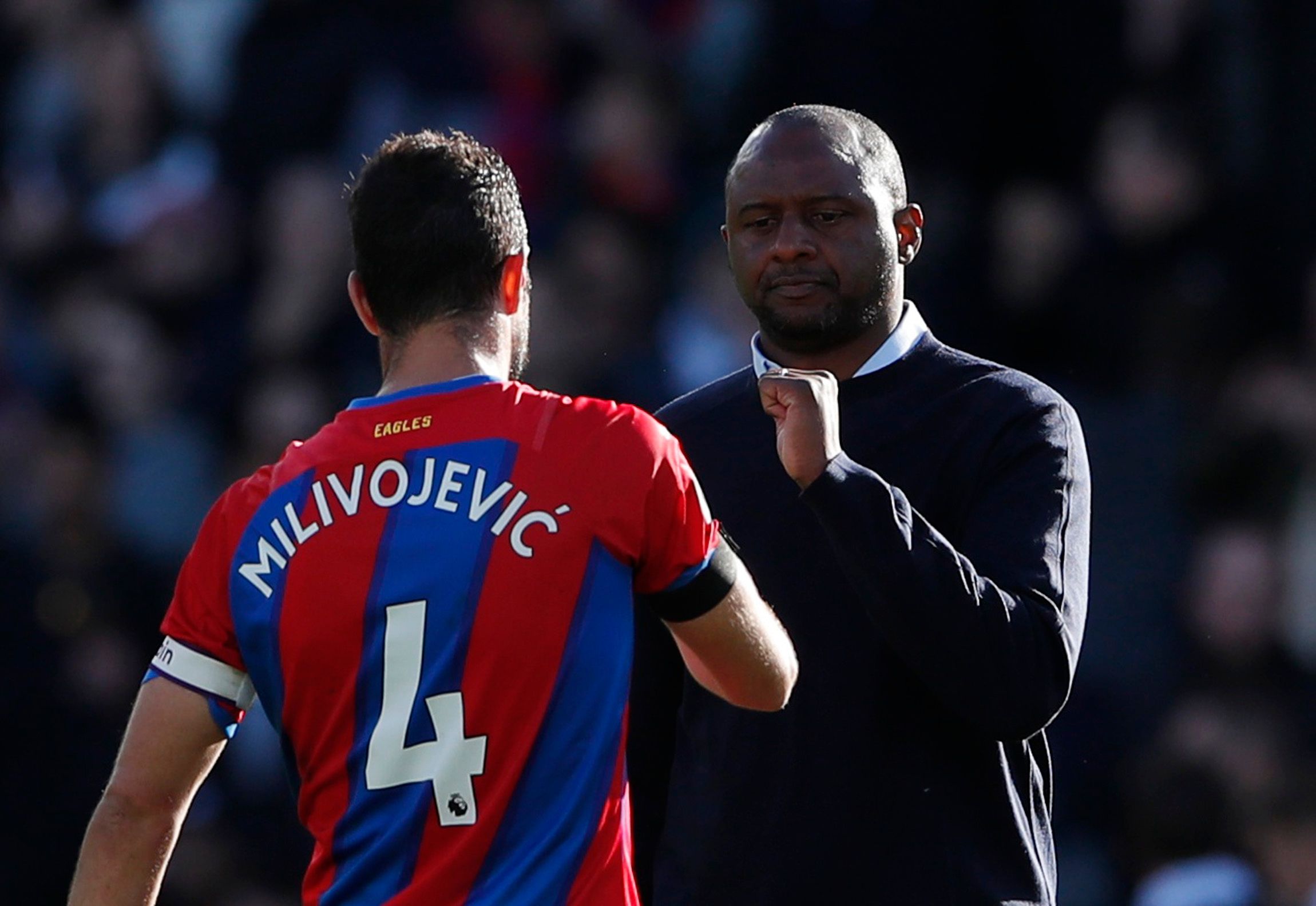 Soccer Football - Premier League - Crystal Palace v Leicester City - Selhurst Park, London, Britain - October 3, 2021 Crystal Palace's Luka Milivojevic shakes hands with  manager Patrick Vieira after the match Action Images via Reuters/Andrew Couldridge EDITORIAL USE ONLY. No use with unauthorized audio, video, data, fixture lists, club/league logos or 'live' services. Online in-match use limited to 75 images, no video emulation. No use in betting, games or single club /league/player publication
