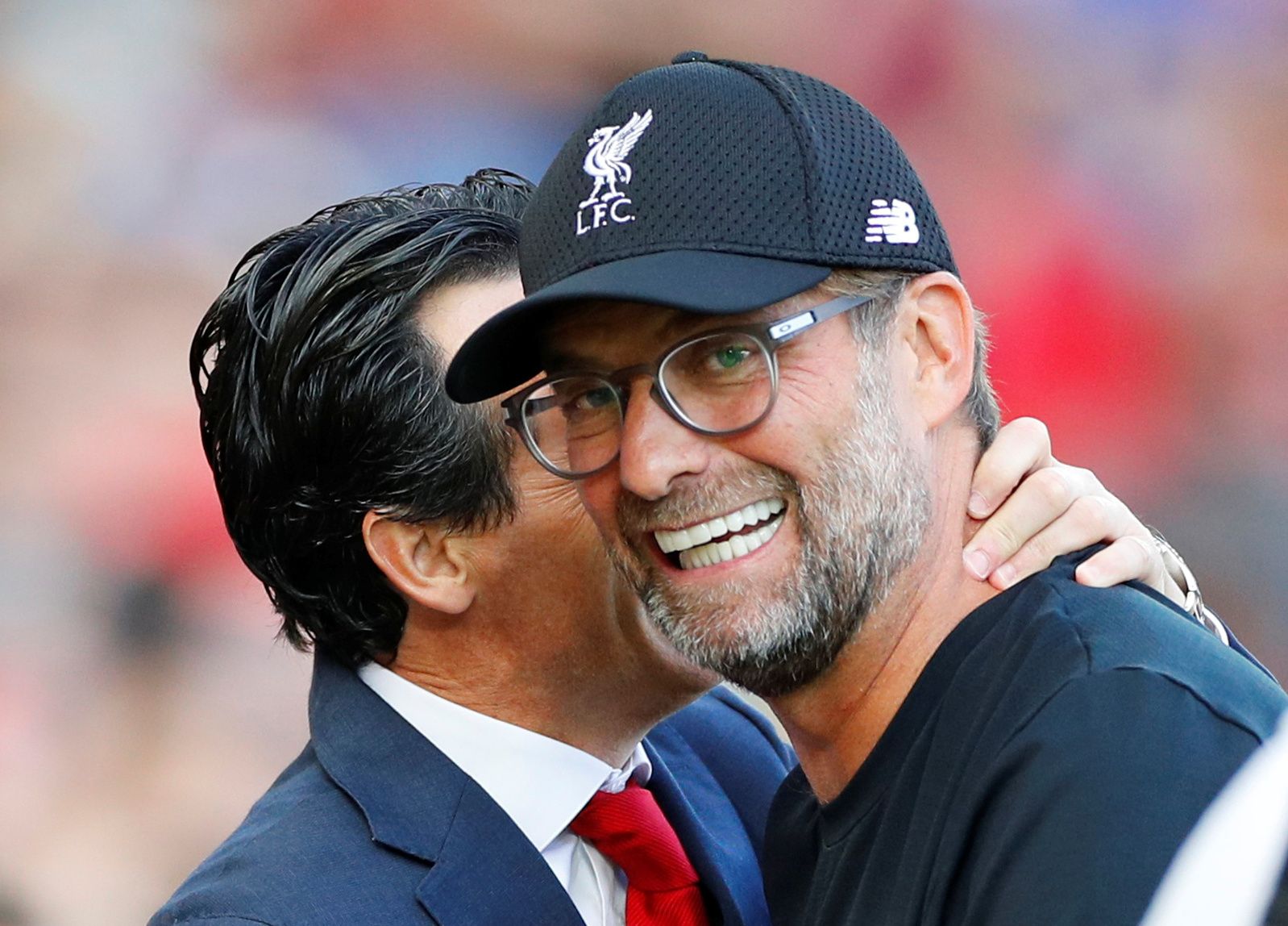 Soccer Football - Premier League - Liverpool v Arsenal - Anfield, Liverpool, Britain - August 24, 2019  Arsenal manager Unai Emery with Liverpool manager Jurgen Klopp before the match   REUTERS/Phil Noble  EDITORIAL USE ONLY. No use with unauthorized audio, video, data, fixture lists, club/league logos or 