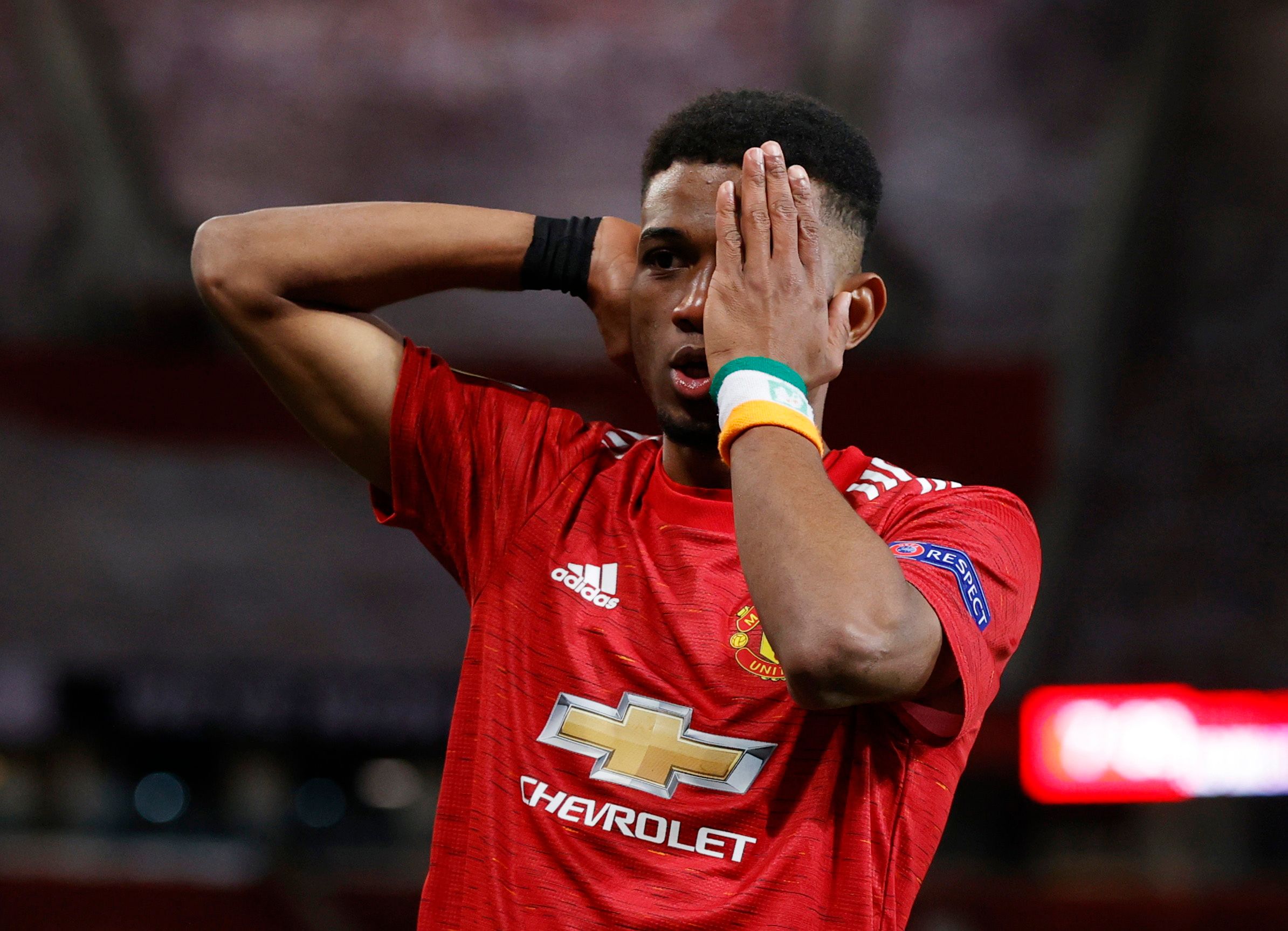 Soccer Football - Europa League - Round of 16 First Leg - Manchester United v AC Milan - Old Trafford, Manchester, Britain - March 11, 2021 Manchester United's Amad Diallo celebrates scoring their first goal REUTERS/Phil Noble