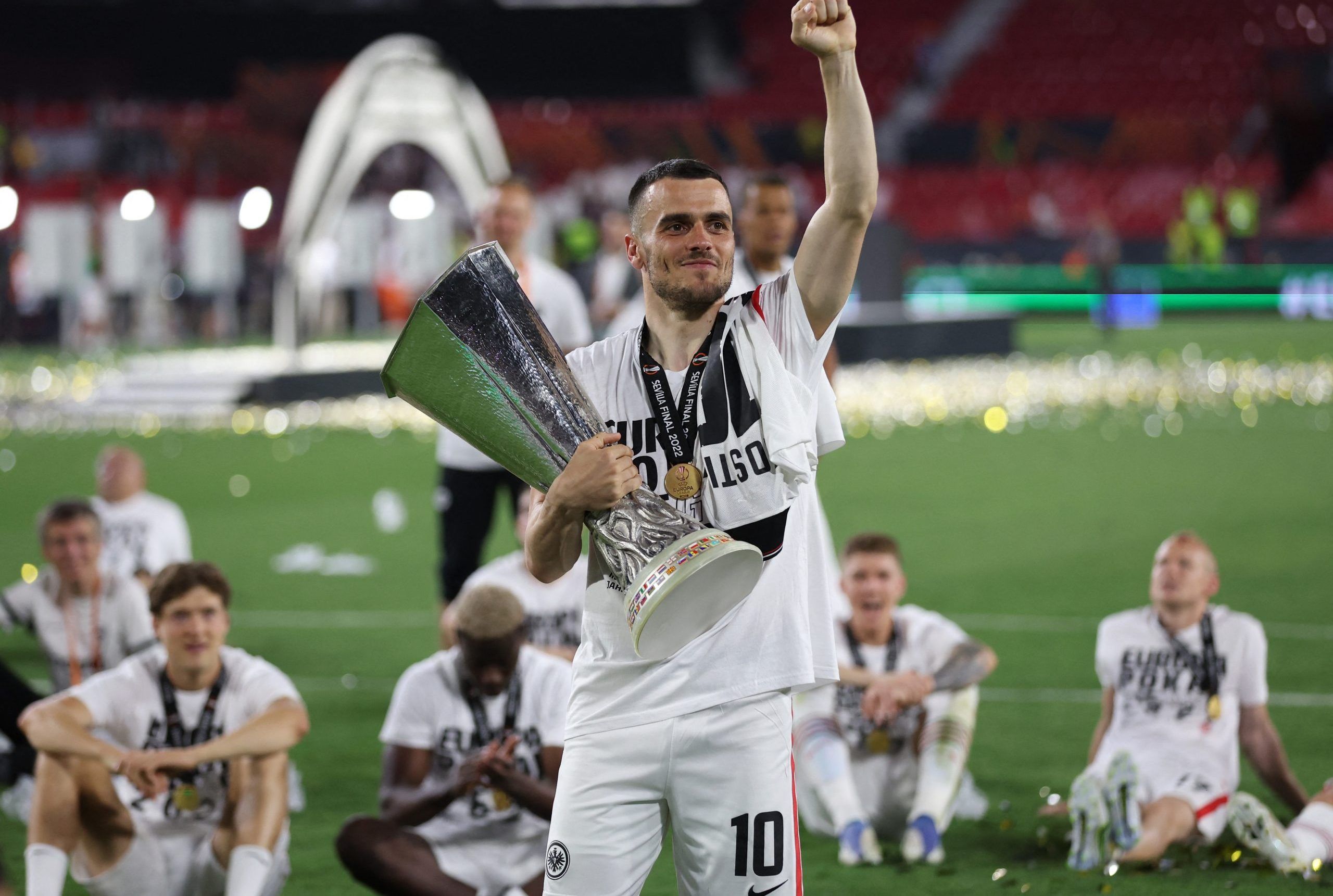 Frankfurt's Filip Kostic celebrates Europa League win with trophy