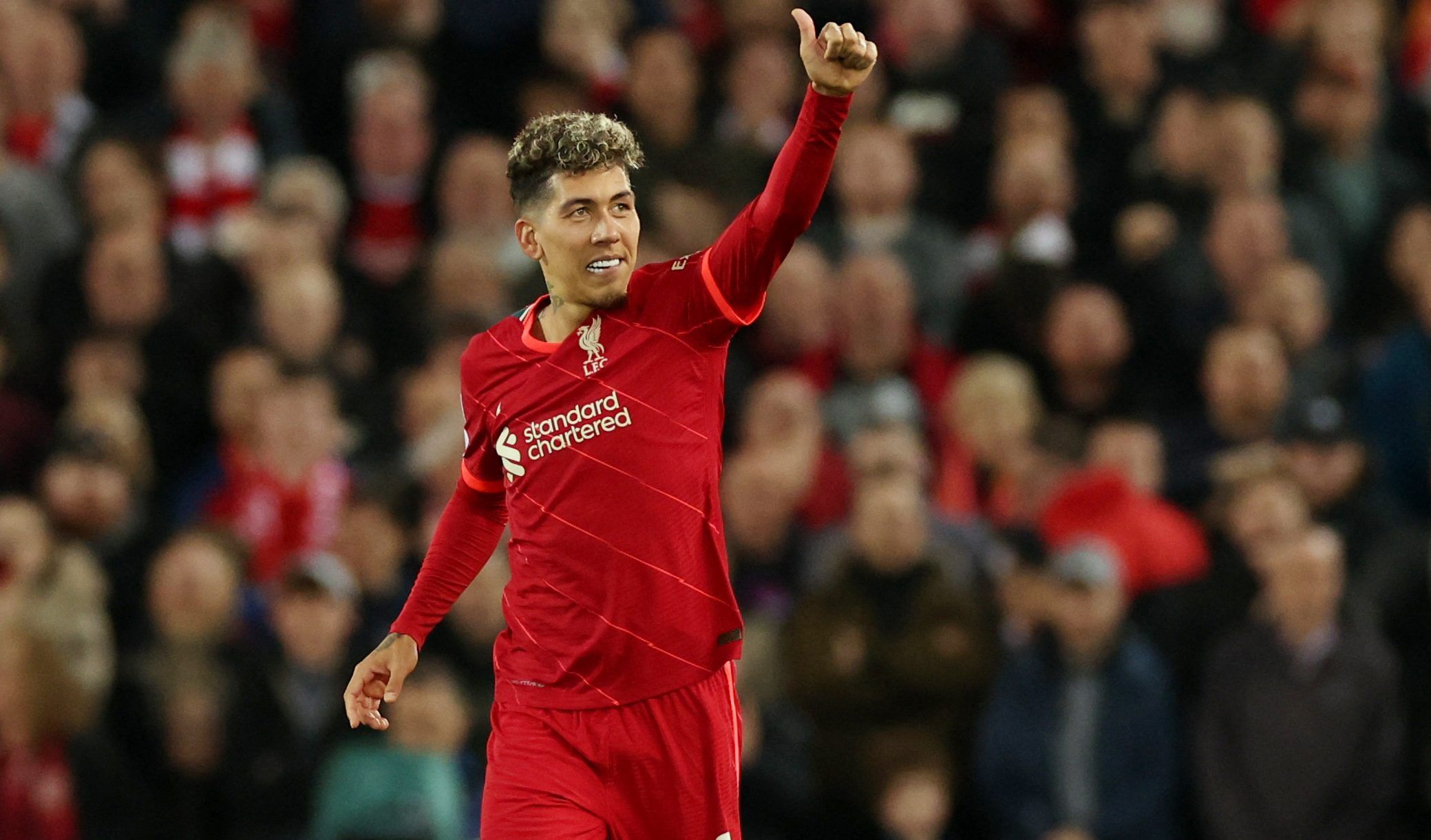 Soccer Football - Champions League - Quarter Final - Second Leg - Liverpool v Benfica - Anfield, Liverpool, Britain - April 13, 2022 Liverpool's Roberto Firmino celebrates scoring their third goal REUTERS/Phil Noble