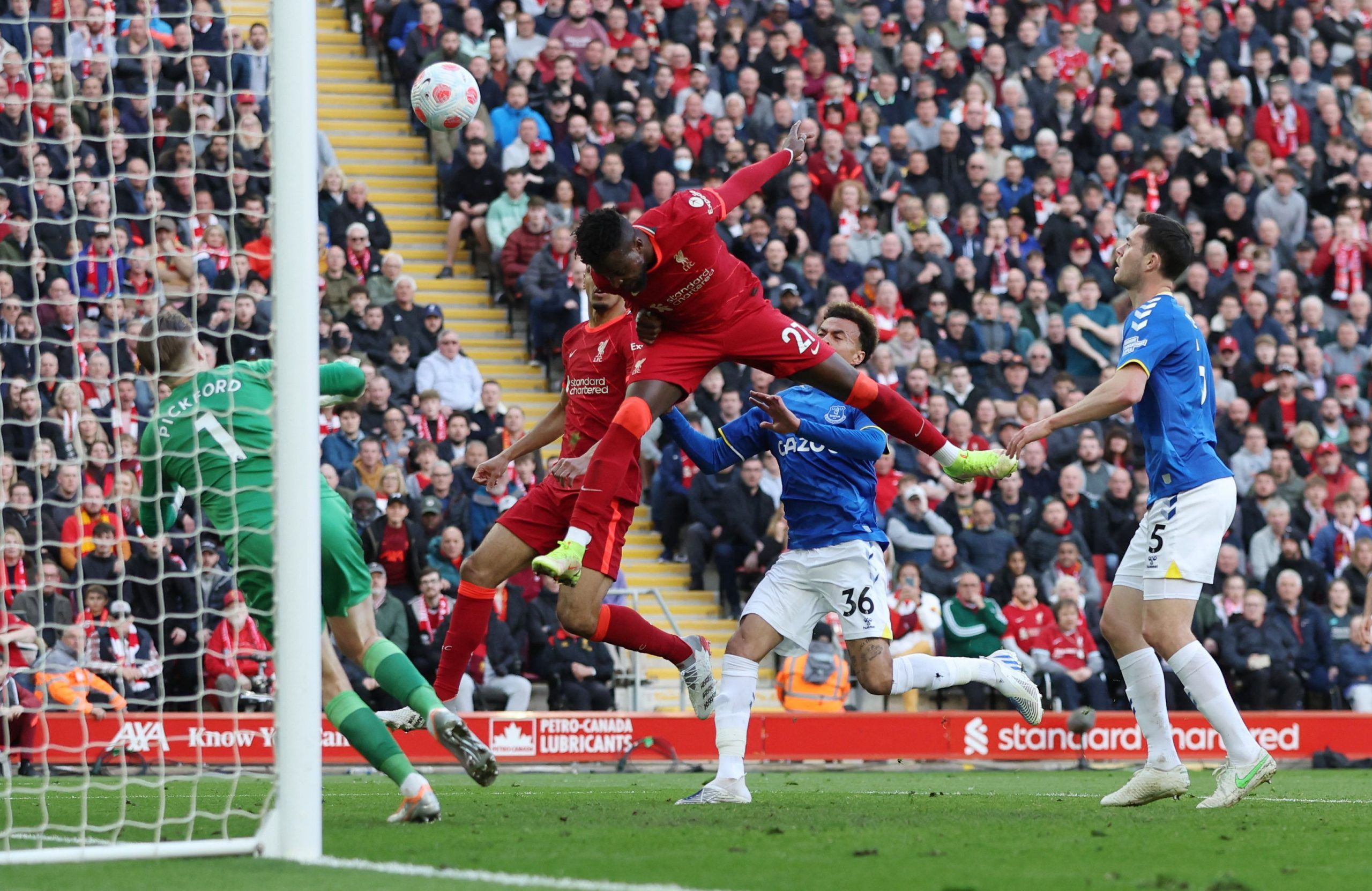 Soccer Football - Premier League - Liverpool v Everton - Anfield, Liverpool, Britain - April 24, 2022  Liverpool's Divock Origi scores their second goal REUTERS/Phil Noble EDITORIAL USE ONLY. No use with unauthorized audio, video, data, fixture lists, club/league logos or 'live' services. Online in-match use limited to 75 images, no video emulation. No use in betting, games or single club /league/player publications.  Please contact your account representative for further details.