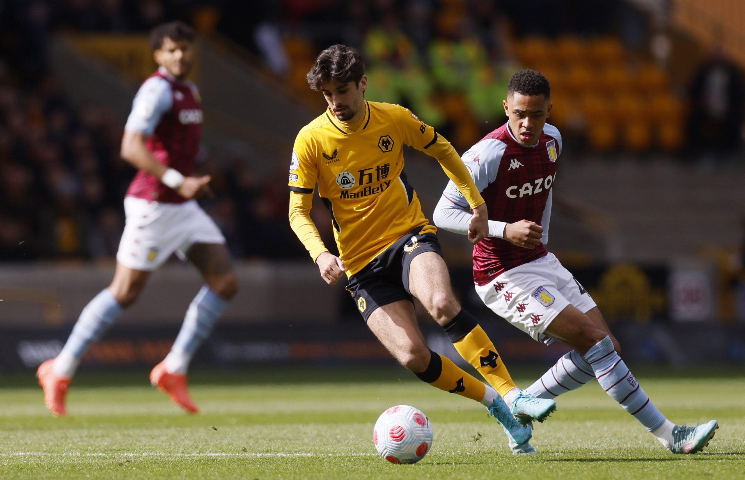 francisco-trincao-wolverhampton-wanderers-barcelona-premier-league-la-liga-wolves-transfer-news-sporting-cpSoccer Football - Premier League - Wolverhampton Wanderers v Aston Villa - Molineux Stadium, Wolverhampton, Britain - April 2, 2022 Wolverhampton Wanderers' Francisco Trincao in action with Aston Villa's Jacob Ramsey Action Images via Reuters/Andrew Couldridge EDITORIAL USE ONLY. No use with unauthorized audio, video, data, fixture lists, club/league logos or 'live' services. Online in-matc