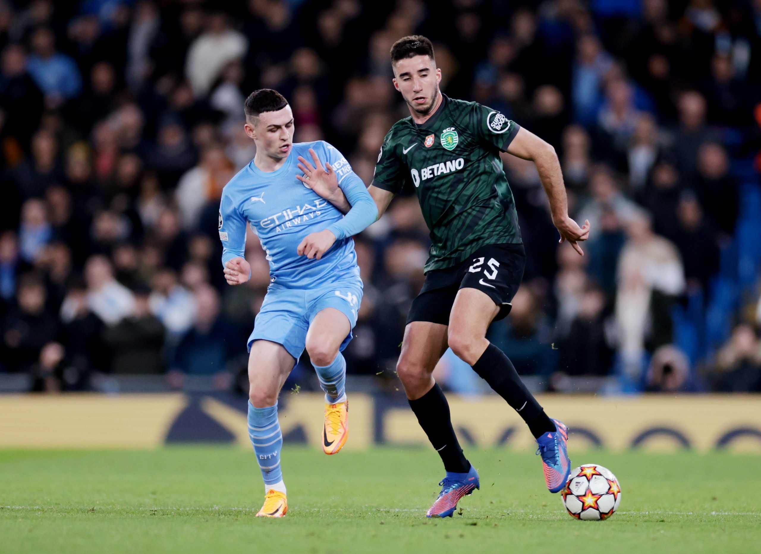 Soccer Football - Champions League - Round of 16 Second Leg - Manchester City v Sporting CP - Etihad Stadium, Manchester, Britain - March 9, 2022 Manchester City's Phil Foden in action with Sporting CP's Goncalo Inacio Action Images via Reuters/Lee Smith