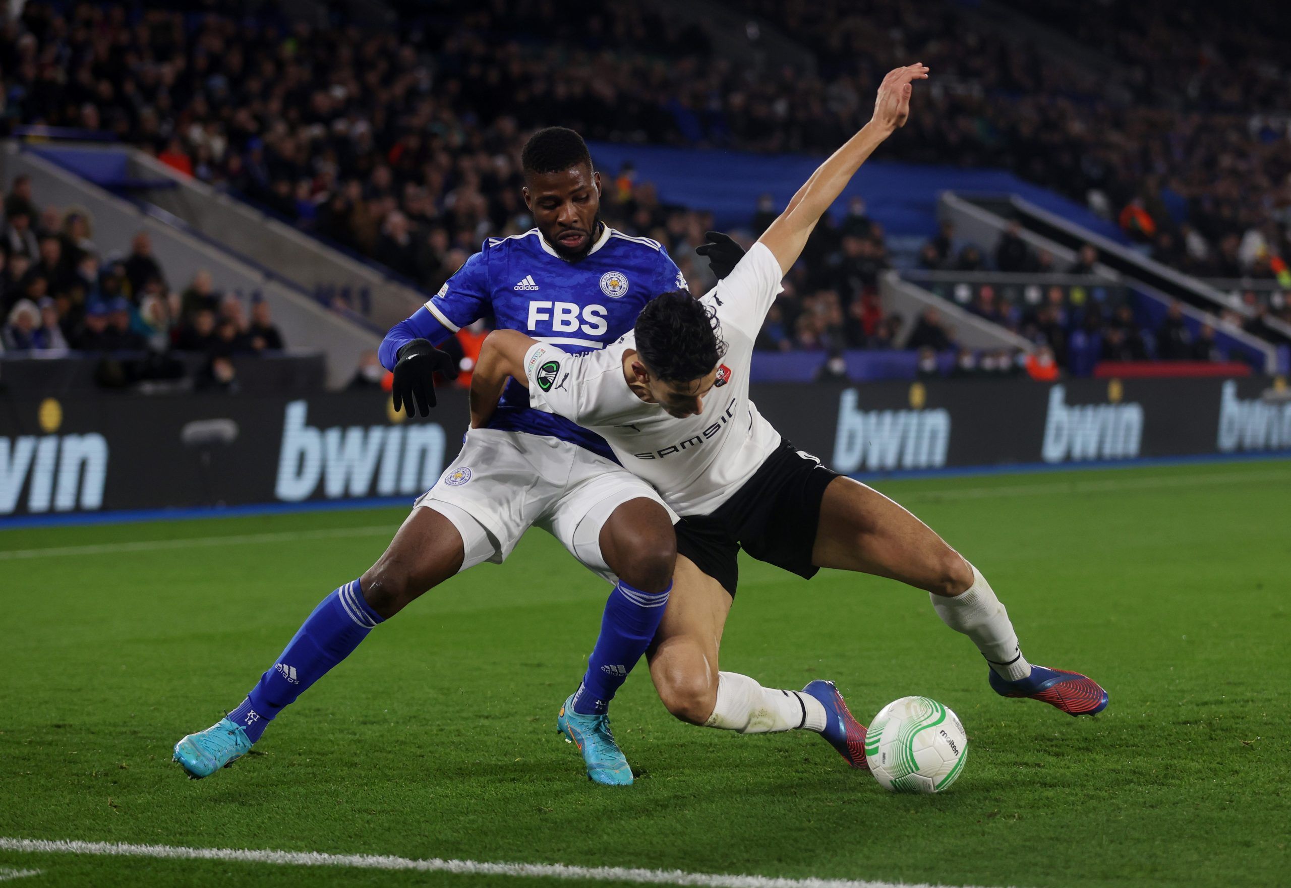 Soccer Football - Europa Conference League - Round of 16 First Leg - Leicester City v Stade Rennes - King Power Stadium, Leicester, Britain - March 10, 2022 Stade Rennes' Nayef Aguerd in action with Leicester City's Kelechi Iheanacho Action Images via Reuters/Matthew Childs