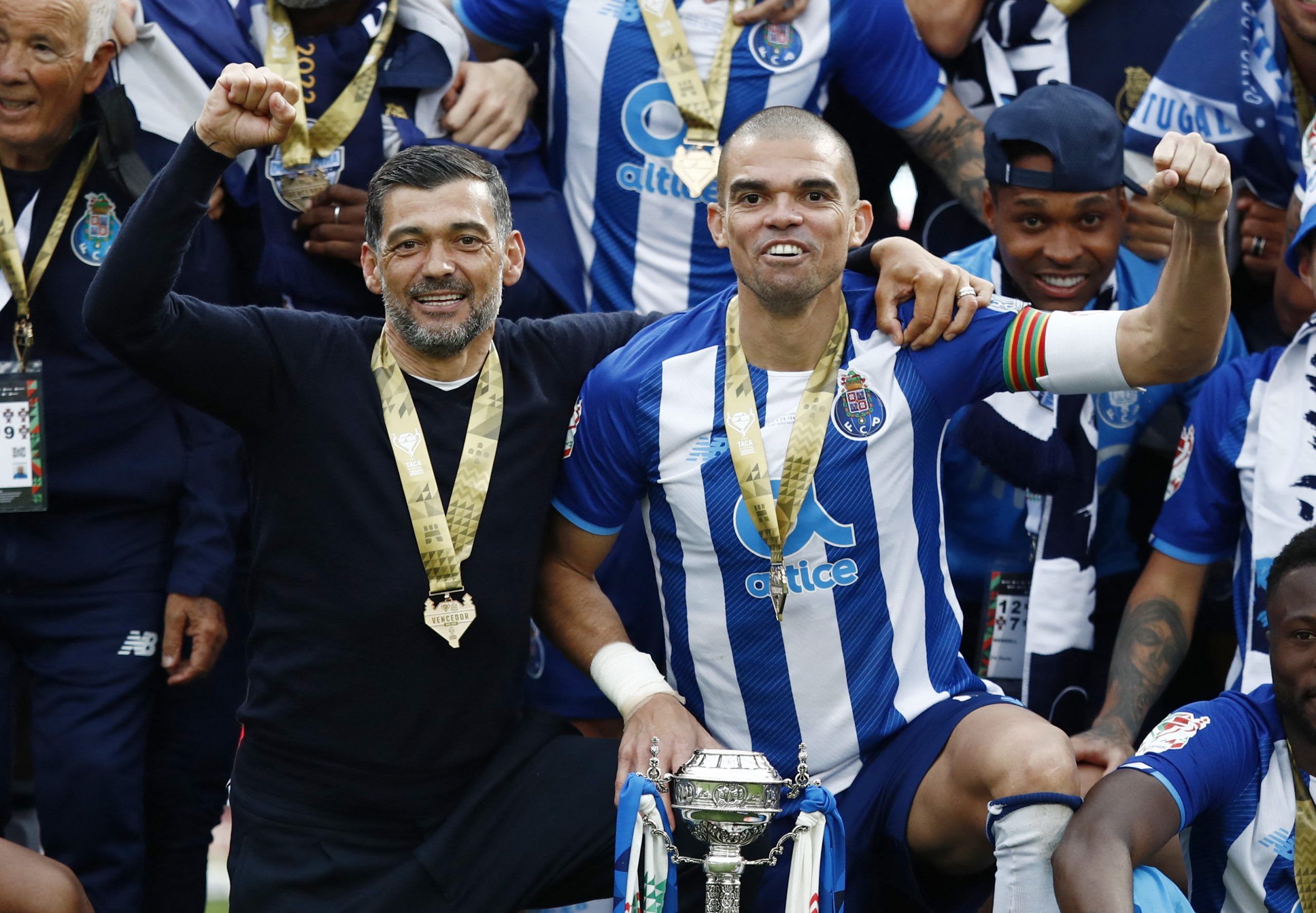 Soccer Football - Portugal Cup Final - FC Porto v Tondela - National Sports Center Jamor, Alges, Portugal - May 22, 2022 FC Porto's Pepe and Sergio Conceicao celebrate with the trophy after winning the Portugal Cup Final REUTERS/Pedro Nunes