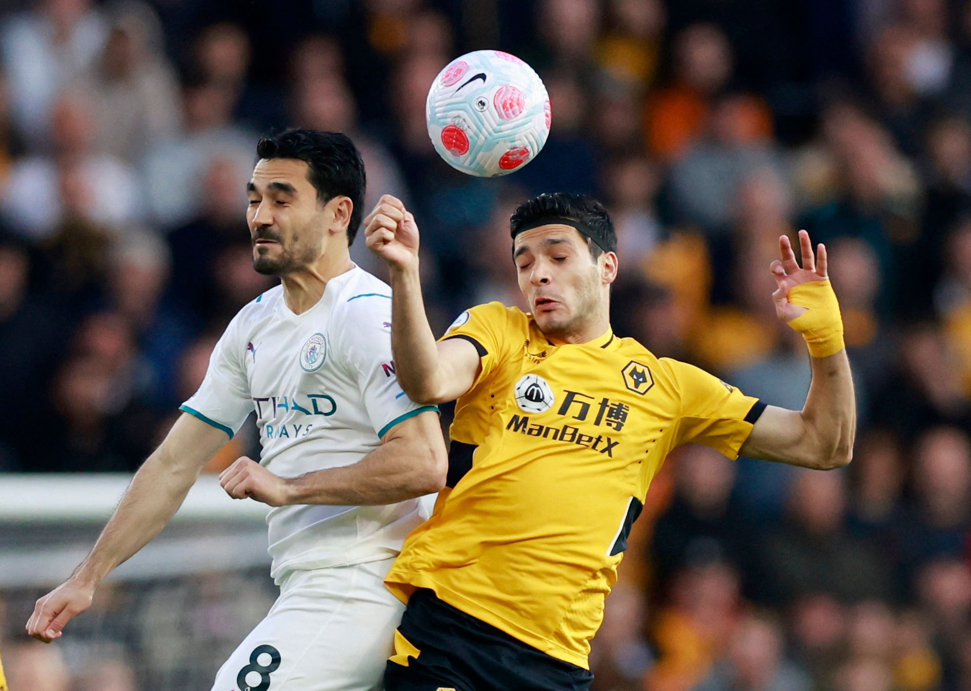 raul-jimenez-wolverhampton-wanderers-wolves-transfer-news-jimenez-exit-crook-talksport-lage-gibbs-white-premier-leagueSoccer Football - Premier League - Wolverhampton Wanderers v Manchester City - Molineux Stadium, Wolverhampton, Britain - May 11, 2022  Manchester City's Ilkay Gundogan in action with Wolverhampton Wanderers' Raul Jimenez Action Images via Reuters/Peter Cziborra EDITORIAL USE ONLY. No use with unauthorized audio, video, data, fixture lists, club/league logos or 'live' services. O