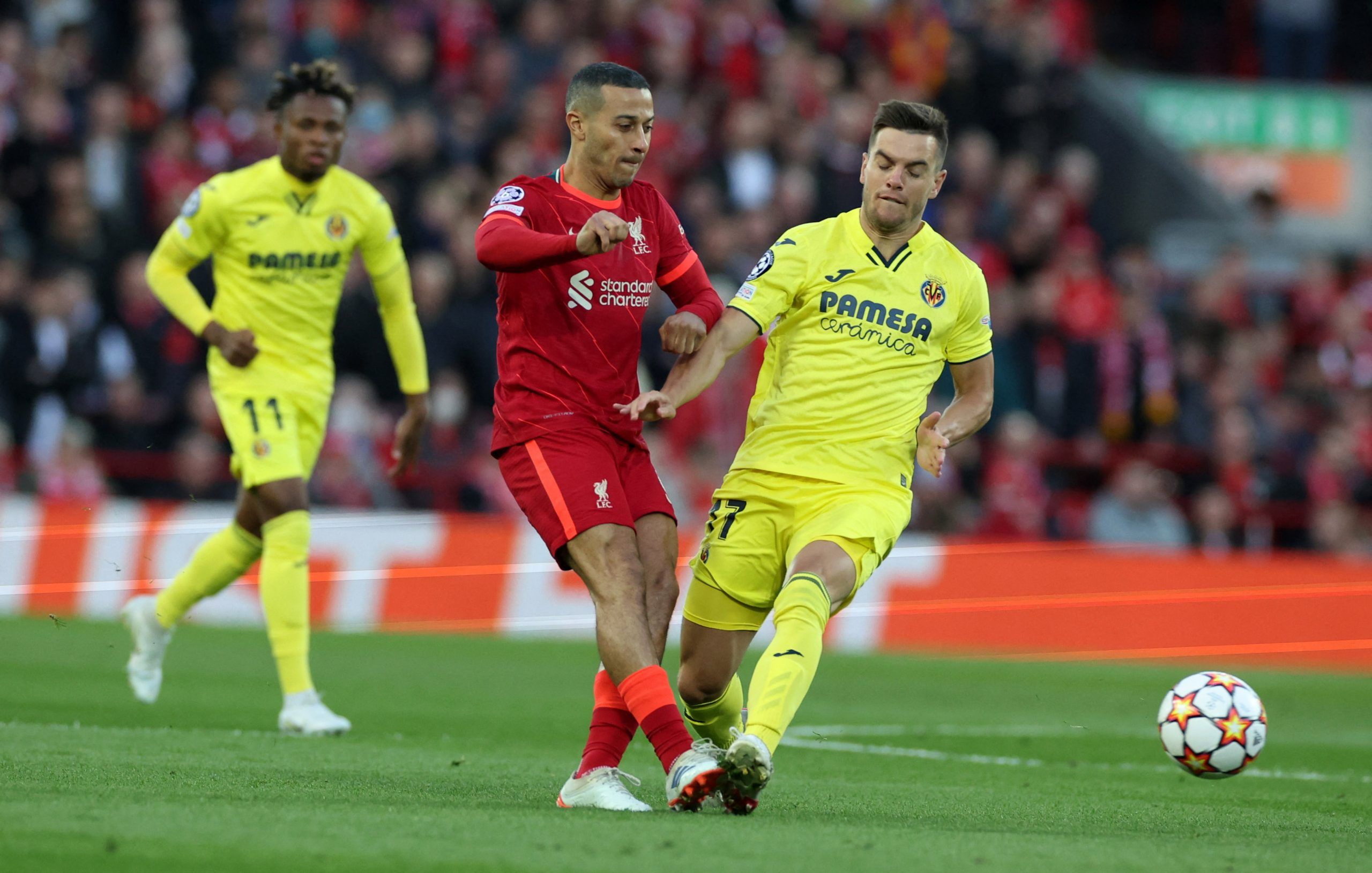 Soccer Football - Champions League - Semi Final - First Leg - Liverpool v Villarreal - Anfield, Liverpool, Britain - April 27, 2022 Liverpool's Thiago Alcantara in action with Villarreal's Giovani Lo Celso REUTERS/Phil Noble