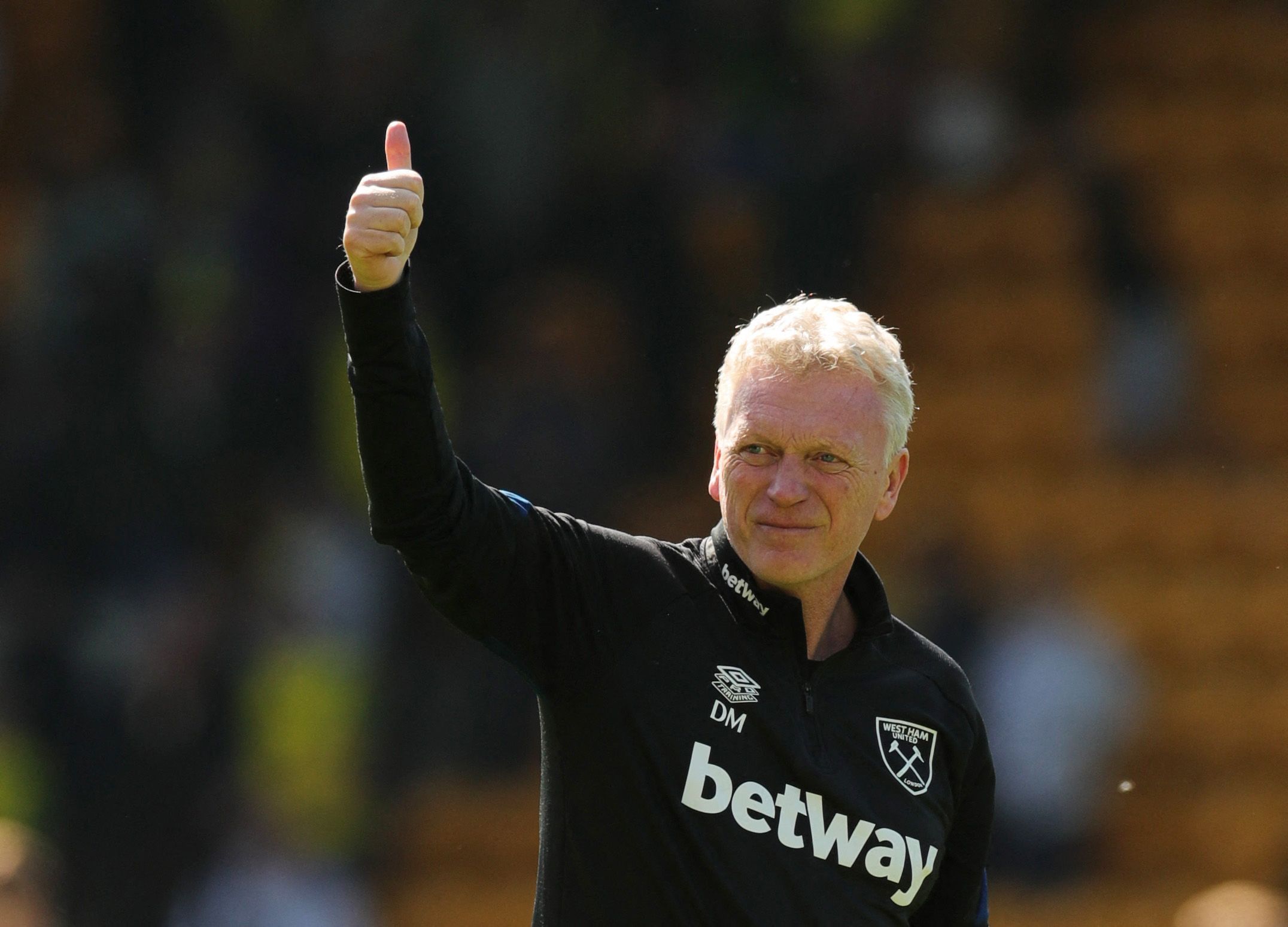Soccer Football - Premier League - Norwich City v West Ham United - Carrow Road, Norwich, Britain - May 8, 2022 West Ham United manager David Moyes acknowledges fans after the match REUTERS/Chris Radburn EDITORIAL USE ONLY. No use with unauthorized audio, video, data, fixture lists, club/league logos or 'live' services. Online in-match use limited to 75 images, no video emulation. No use in betting, games or single club /league/player publications.  Please contact your account representative for