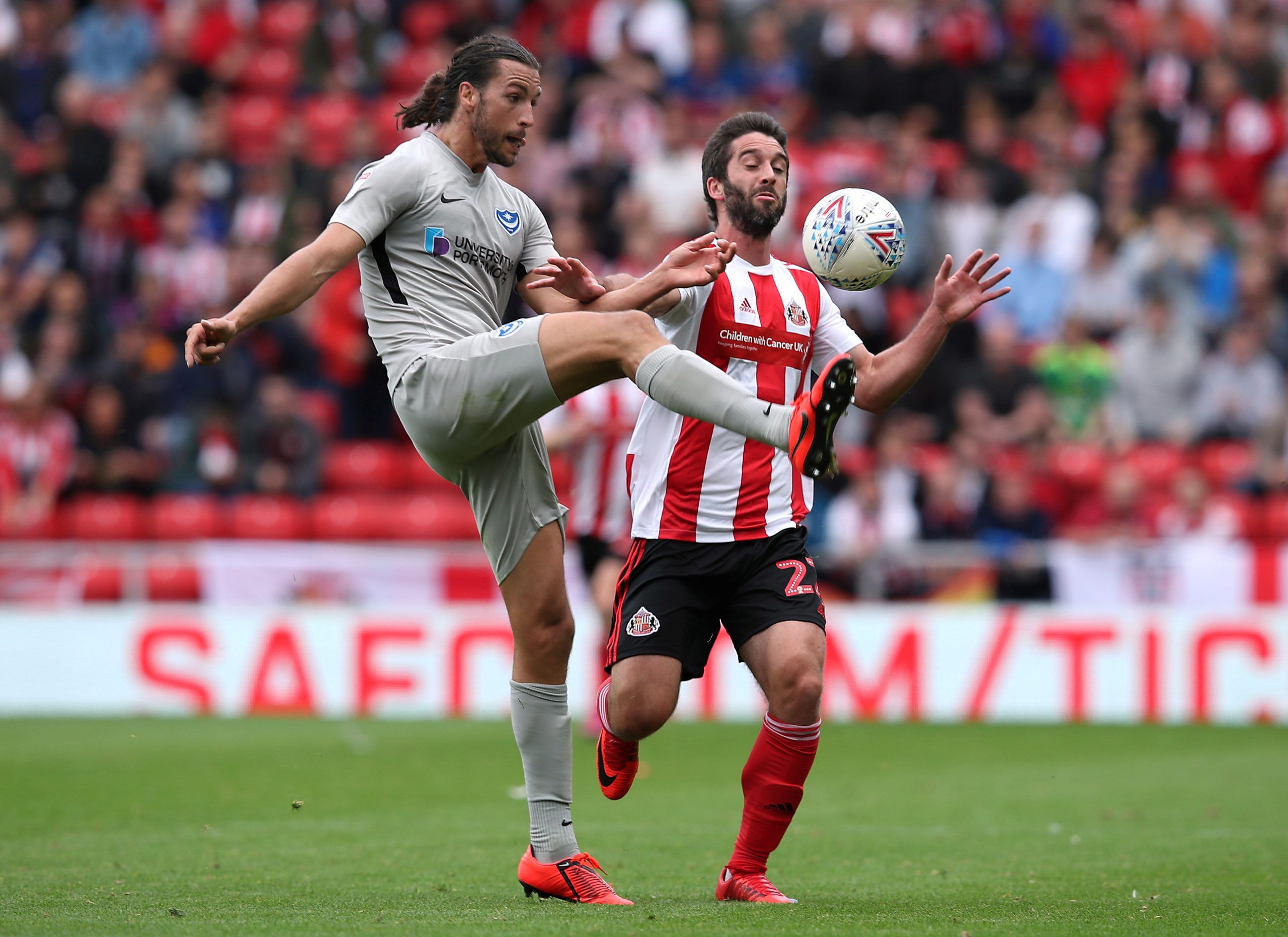 will-grigg-sunderland-league-one-rotherham-united-championship-alex-neil-paul-warne-transfer-latestSoccer Football - League One - Sunderland v Portsmouth - Stadium of Light, Sunderland, Britain - August 17, 2019   Portsmouth's Christian Burgess in action with Sunderland's Will Grigg   Action Images/John Clifton    EDITORIAL USE ONLY. No use with unauthorized audio, video, data, fixture lists, club/league logos or 