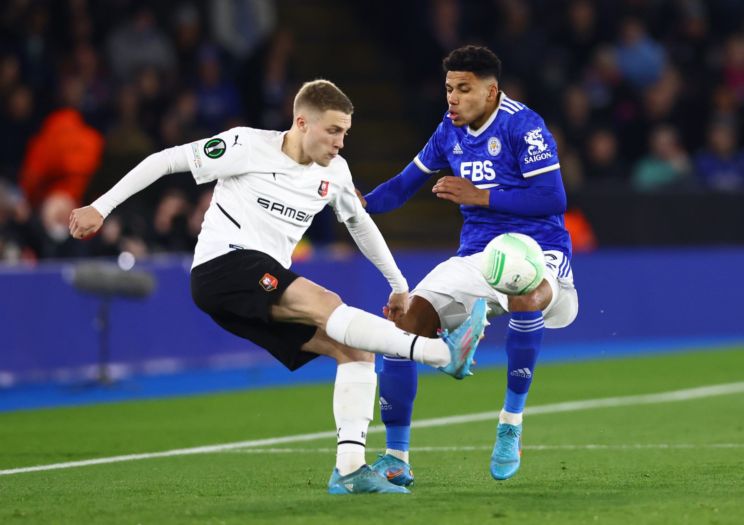 Soccer Football - Europa Conference League - Round of 16 First Leg - Leicester City v Stade Rennes - King Power Stadium, Leicester, Britain - March 10, 2022 Leicester City's James Justin in action with  Stade Rennes' Adrien Truffert REUTERS/David Klein