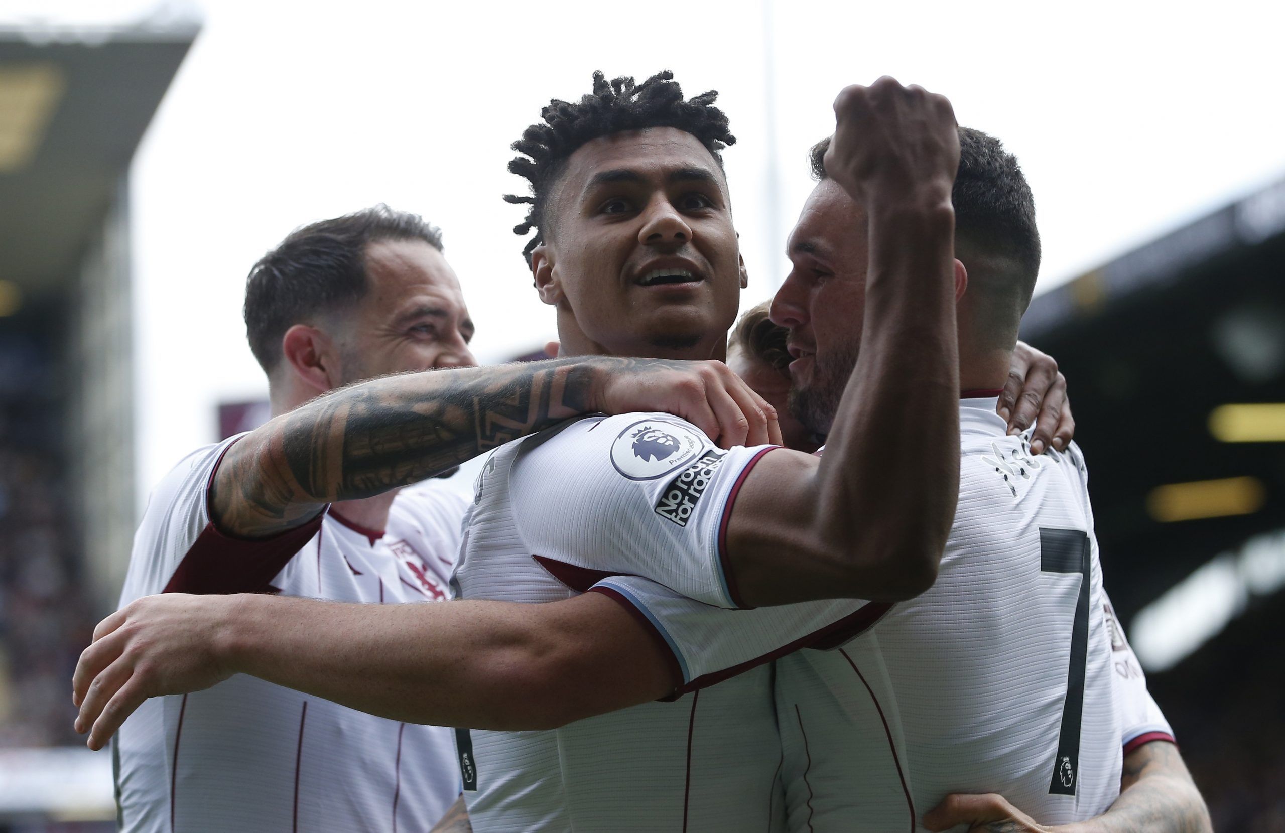 Soccer Football - Premier League - Burnley v Aston Villa - Turf Moor, Burnley, Britain - May 7, 2022 Aston Villa's Ollie Watkins celebrates scoring their third goal with Danny Ings and John McGinn REUTERS/Craig Brough EDITORIAL USE ONLY. No use with unauthorized audio, video, data, fixture lists, club/league logos or 'live' services. Online in-match use limited to 75 images, no video emulation. No use in betting, games or single club /league/player publications.  Please contact your account repr