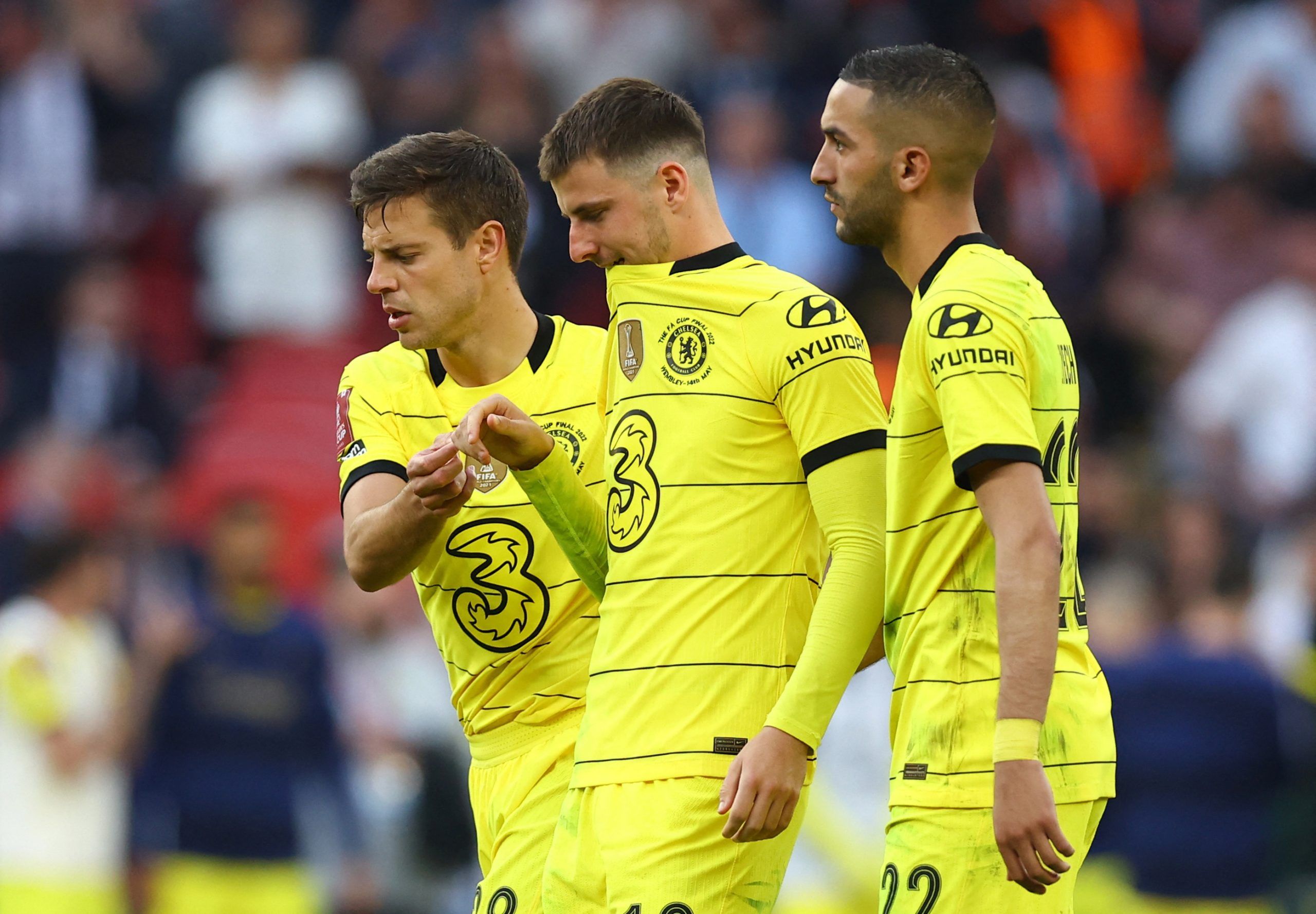 Soccer Football - FA Cup - Final - Chelsea v Liverpool - Wembley Stadium, London, Britain - May 14, 2022 Chelsea's Mason Mount looks dejected with Hakim Ziyech and Cesar Azpilicueta after having his penalty saved by Liverpool's Alisson during the shoot-out REUTERS/Hannah Mckay
