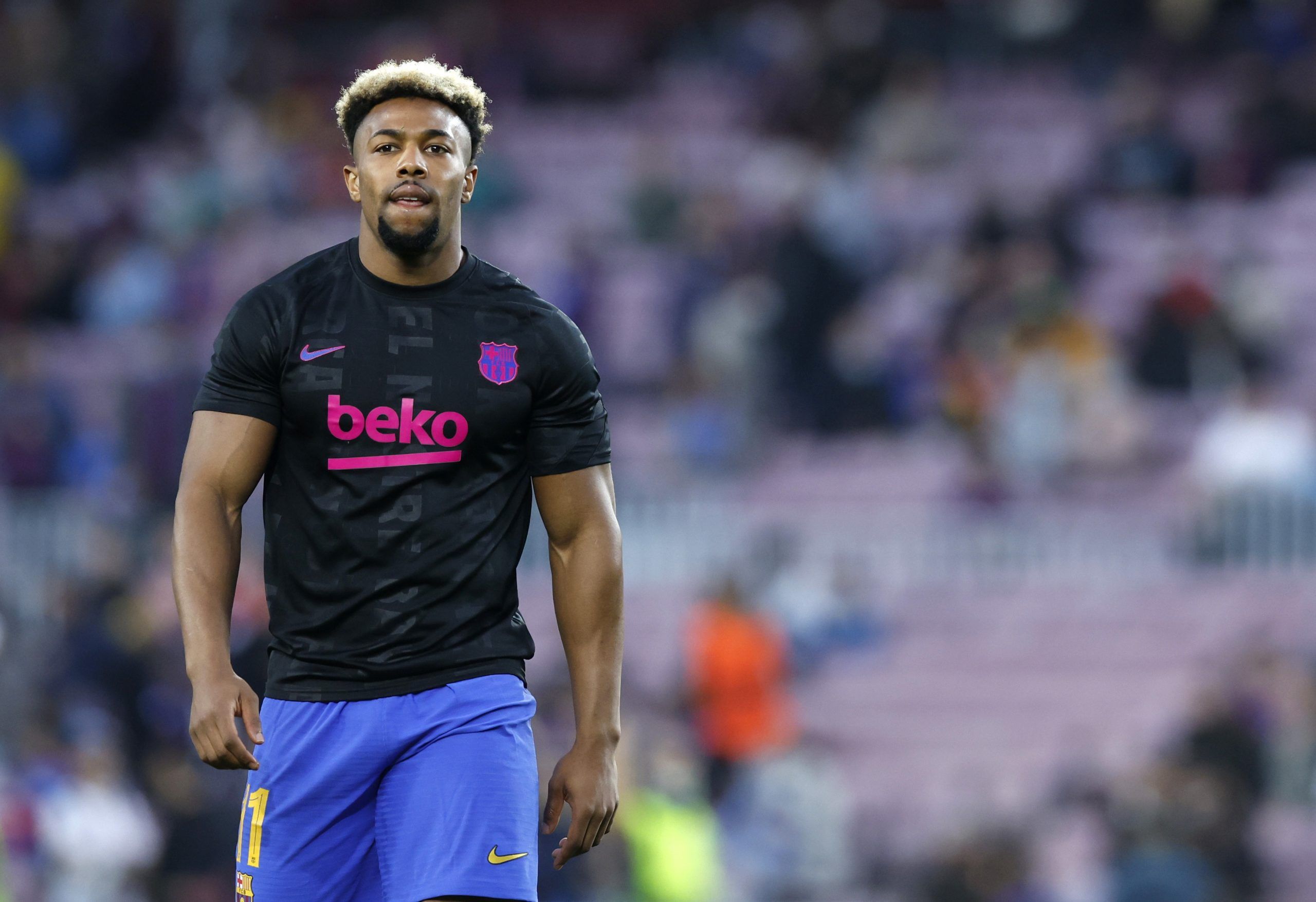 Soccer Football - Europa League - Play Off First Leg - FC Barcelona v Napoli - Camp Nou, Barcelona, Spain - February 17, 2022 FC Barcelona's Adama Traore during the warm up before the match REUTERS/Albert Gea