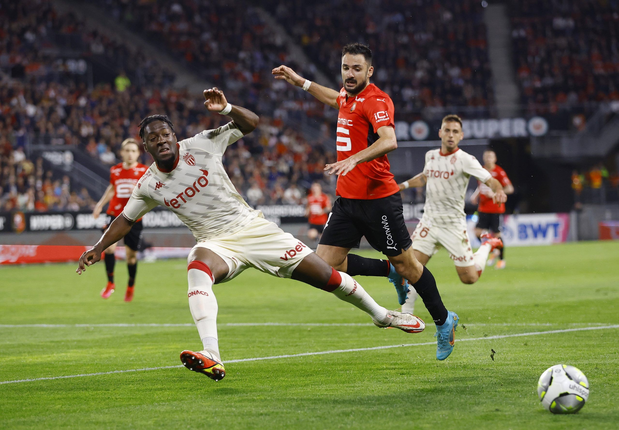 Soccer Football - Ligue 1 - Stade Rennes v AS Monaco - Roazhon Park, Rennes, France - April 15, 2022 AS Monaco's Axel Disasi in action with Stade Rennes' Gaetan Laborde REUTERS/Stephane Mahe