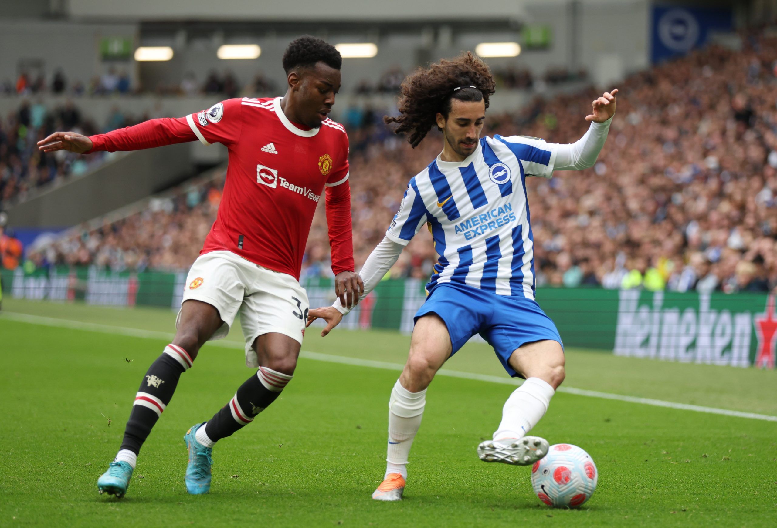 Soccer Football - Premier League - Brighton &amp; Hove Albion v Manchester United - The American Express Community Stadium, Brighton, Britain - May 7, 2022 Manchester United's Anthony Elanga in action with Brighton &amp; Hove Albion's Marc Cucurella REUTERS/Ian Walton EDITORIAL USE ONLY. No use with unauthorized audio, video, data, fixture lists, club/league logos or 'live' services. Online in-match use limited to 75 images, no video emulation. No use in betting, games or single club /league/pla