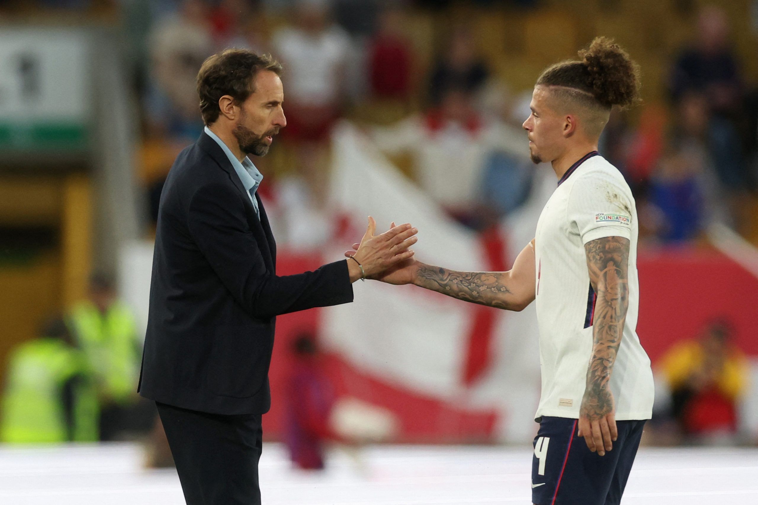 Soccer Football - UEFA Nations League - Group C - England v Hungary - Molineux Stadium, Wolverhampton, Britain - June 14, 2022 England manager Gareth Southgate and Kalvin Phillips look dejected after the match Action Images via Reuters/Paul Childs