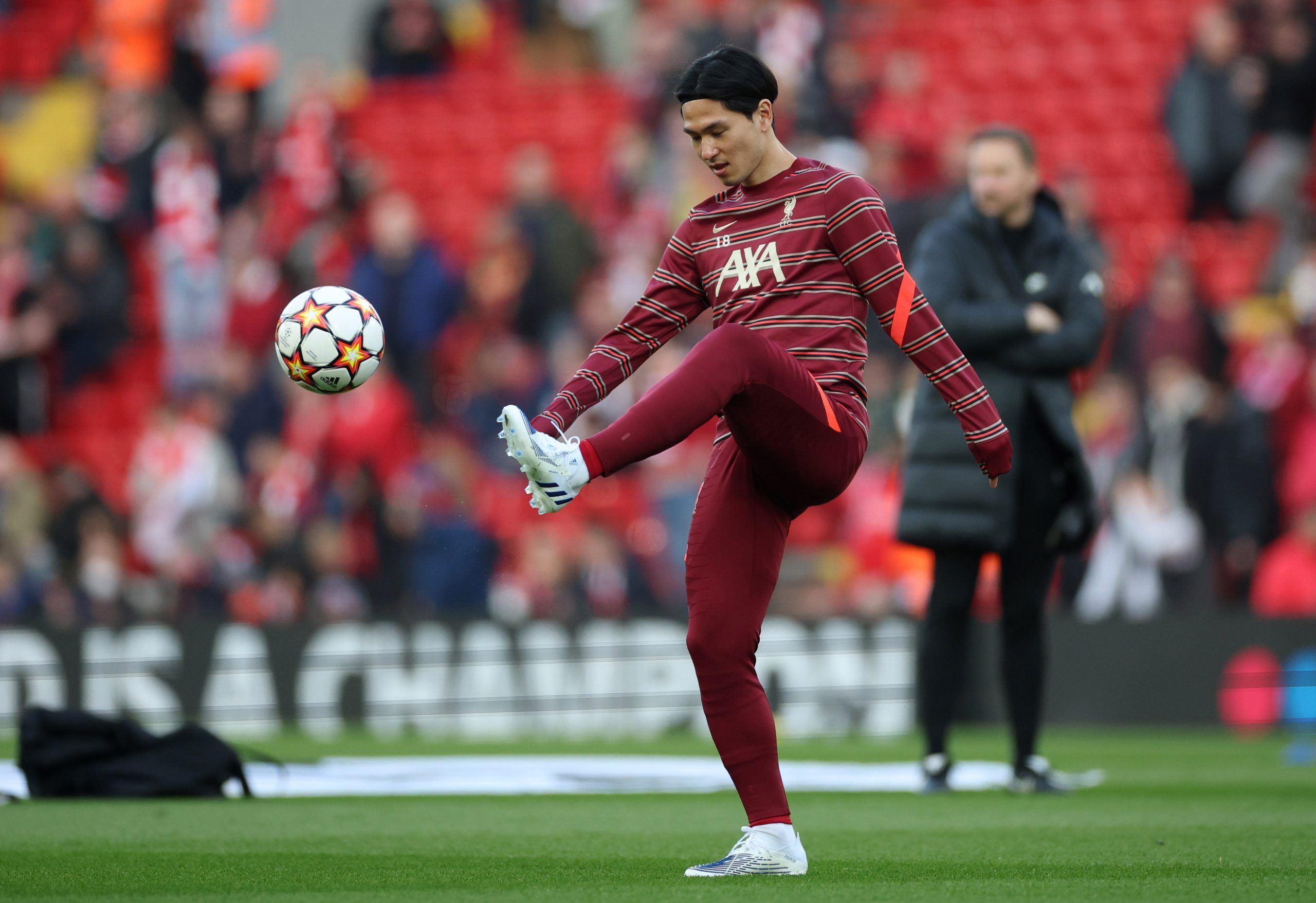 Soccer Football - Champions League - Semi Final - First Leg - Liverpool v Villarreal - Anfield, Liverpool, Britain - April 27, 2022 Liverpool's Takumi Minamino during the warm up before the match REUTERS/Phil Noble
