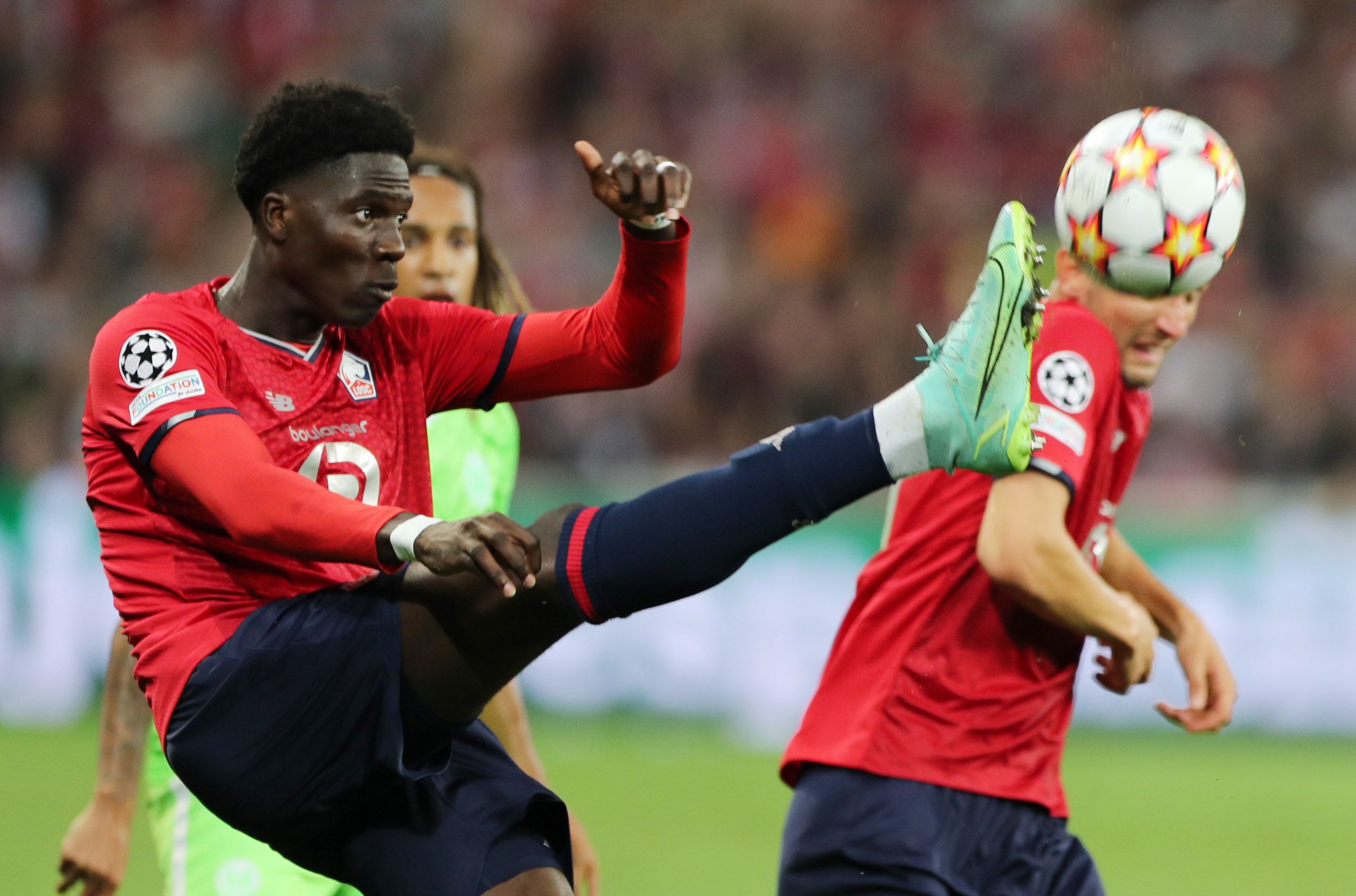 Soccer Football - Champions League - Group G - Lille v Vfl Wolfsburg - Stade Pierre-Mauroy, Villeneuve-d'Ascq, France - September 14, 2021  Lille's Amadou Onana in action REUTERS/Pascal Rossignol