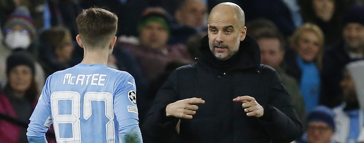 Soccer Football - Champions League - Round of 16 Second Leg - Manchester City v Sporting CP - Etihad Stadium, Manchester, Britain - March 9, 2022  Manchester City manager Pep Guardiola talks to James Mcatee REUTERS/Craig Brough
