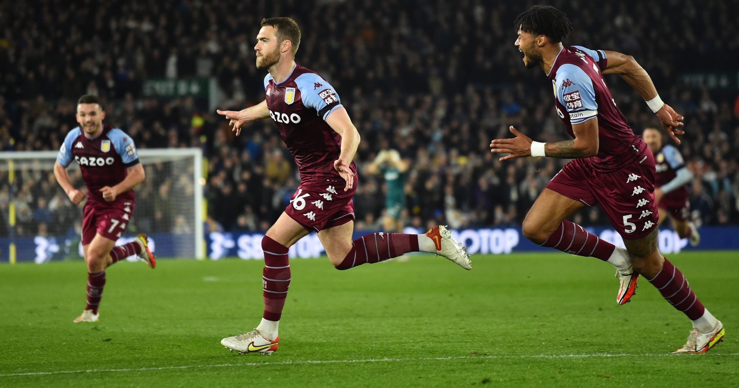 Aston Villa's Calum Chambers celebrates scoring their third goal with teammates