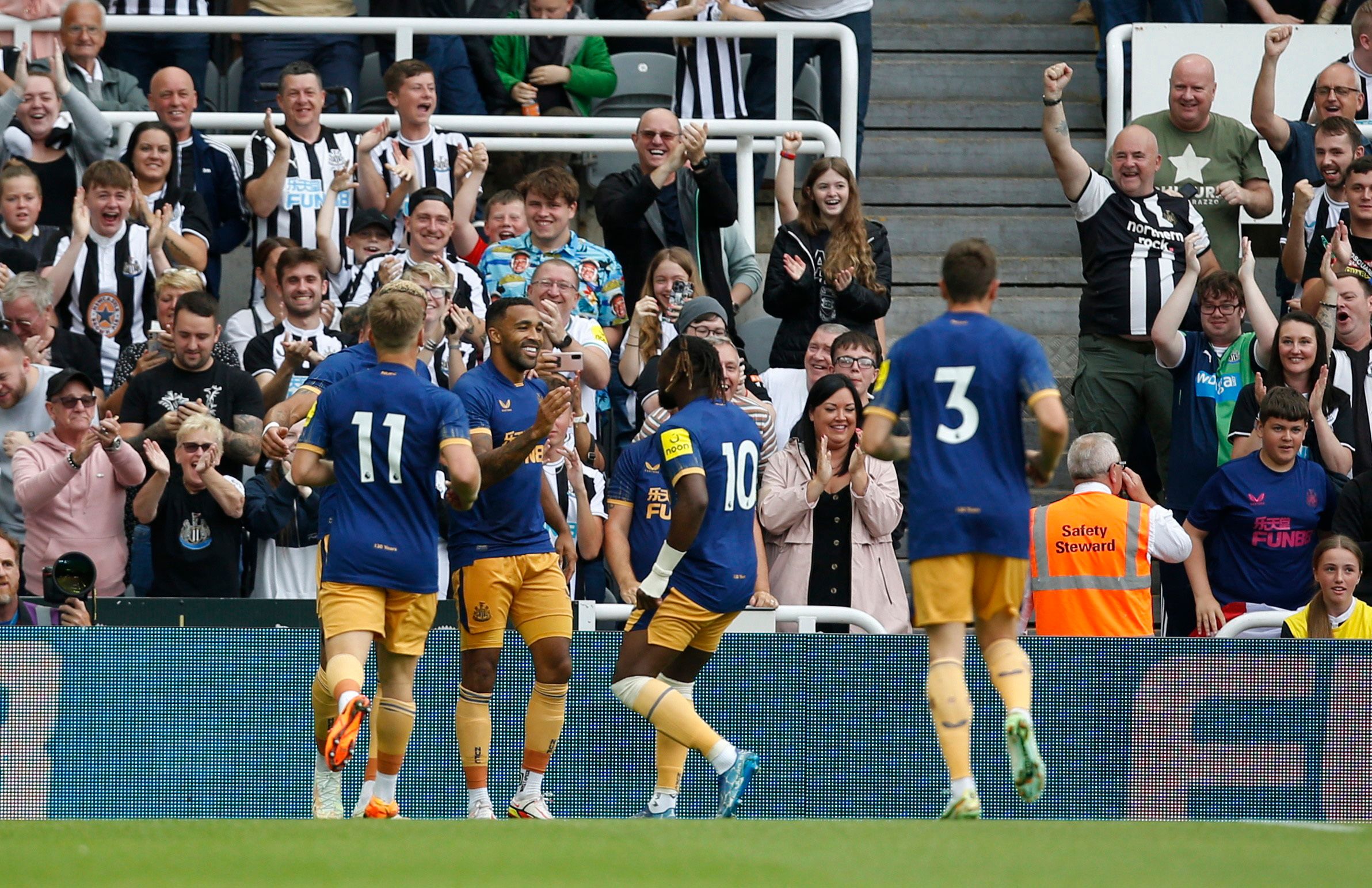 Soccer Football - Pre Season Friendly - Newcastle United v Athletic Bilbao - St James' Park, Newcastle, Britain - July 30, 2022 Newcastle United's Callum Wilson celebrates scoring their first goal with teammates Action Images via Reuters/Ed Sykes