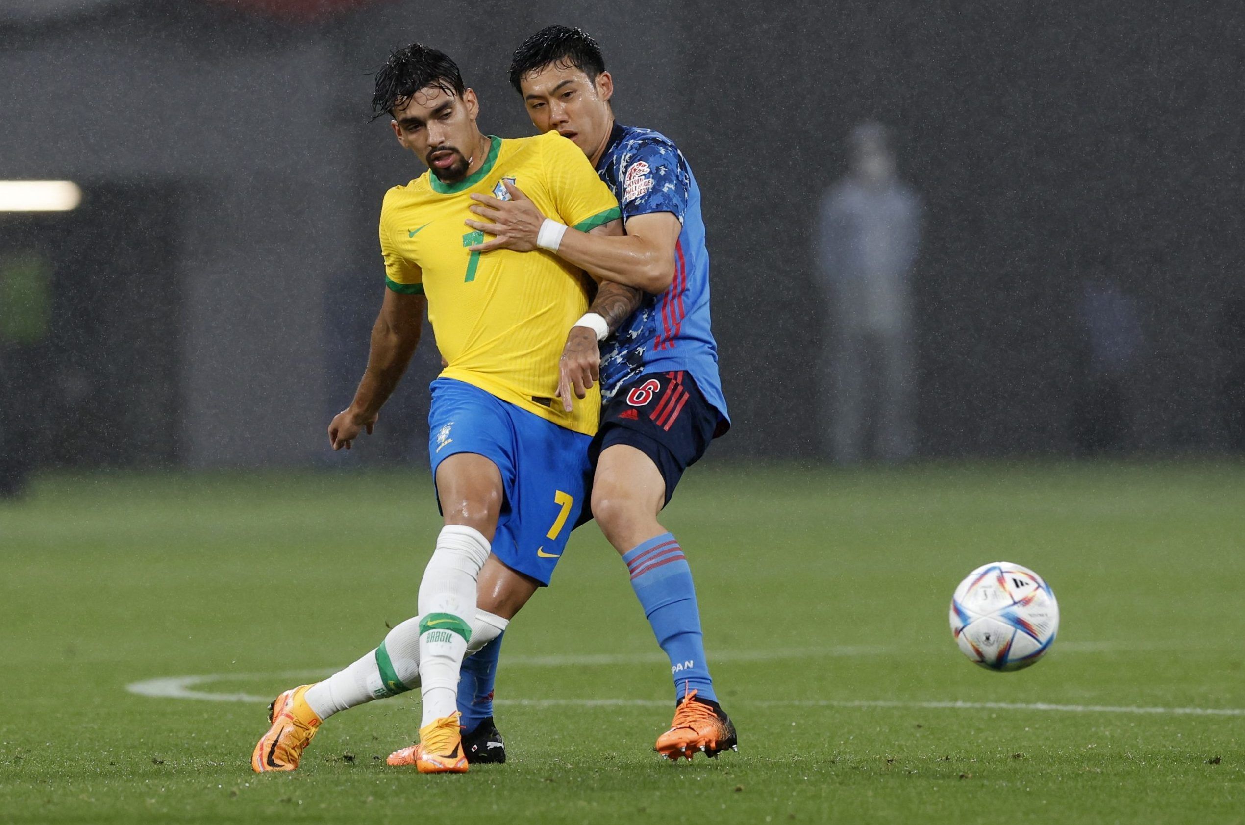 Brazil's Lucas Paqueta in action with Japan's Wataru Endo