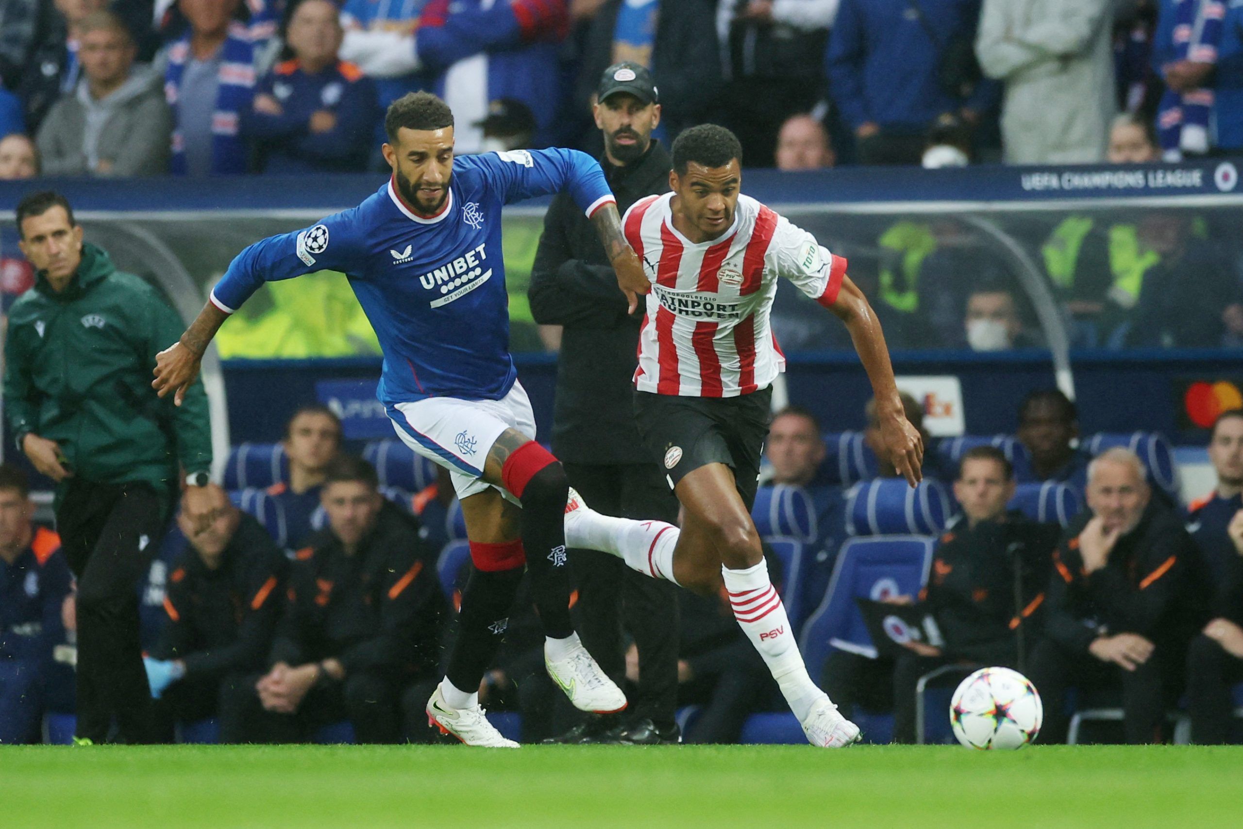 Soccer Football - Champions League Qualifying - Play-off First Leg - Rangers v PSV Eindhoven - Ibrox Stadium, Glasgow, Scotland, Britain - August 16, 2022 PSV Eindhoven's Cody Gakpo in action with Rangers' Connor Goldson Action Images via Reuters/Lee Smith