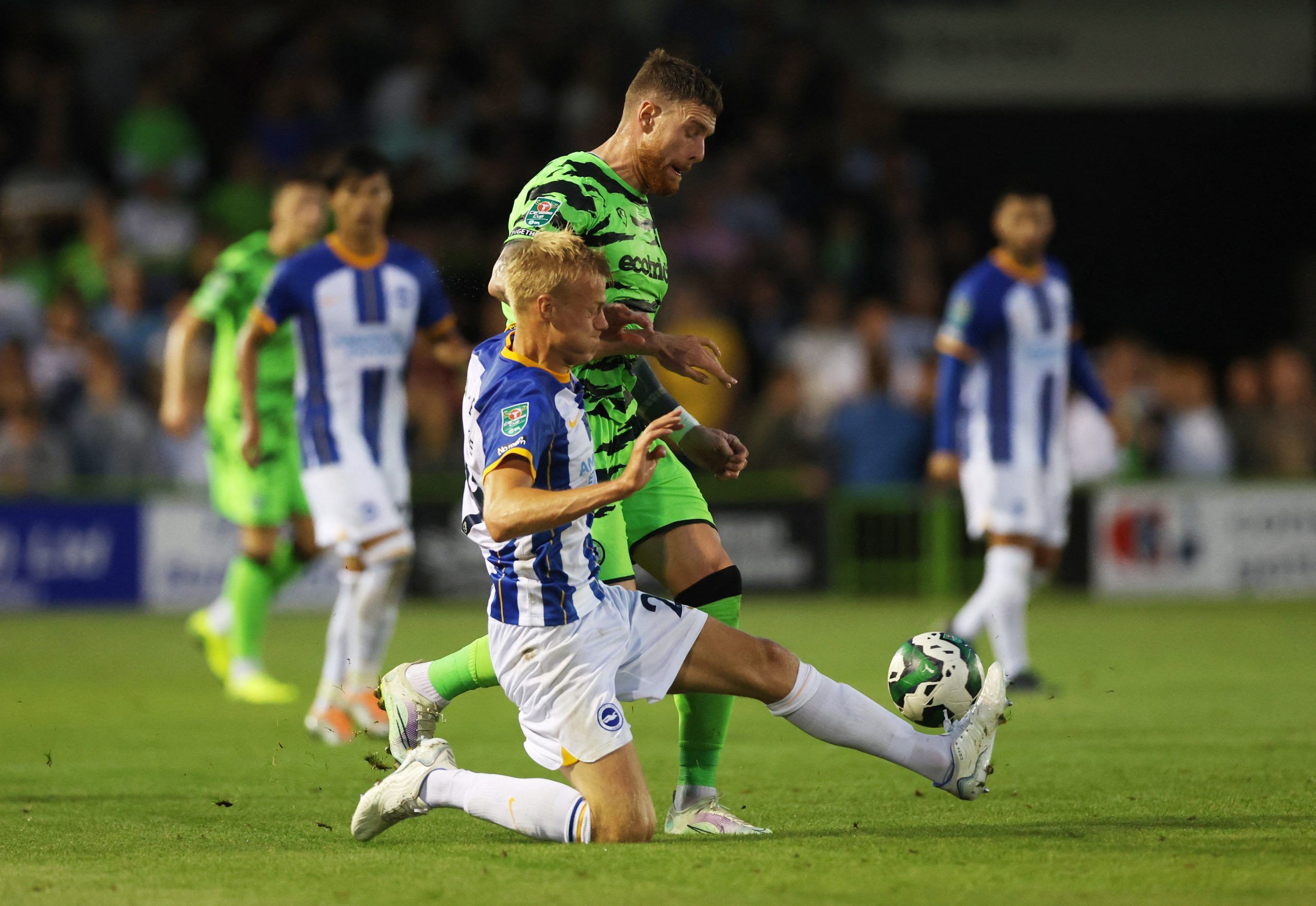 Soccer Football - Carabao Cup Second Round - Forest Green Rovers v Brighton &amp; Hove Albion - The New Lawn, Nailsworth, Britain - August 24, 2022 Brighton &amp; Hove Albion's Jan Paul van Hecke in action with Forest Green Rovers' Connor Wickham Action Images via Reuters/Matthew Childs EDITORIAL USE ONLY. No use with unauthorized audio, video, data, fixture lists, club/league logos or 'live' services. Online in-match use limited to 75 images, no video emulation. No use in betting, games or sing