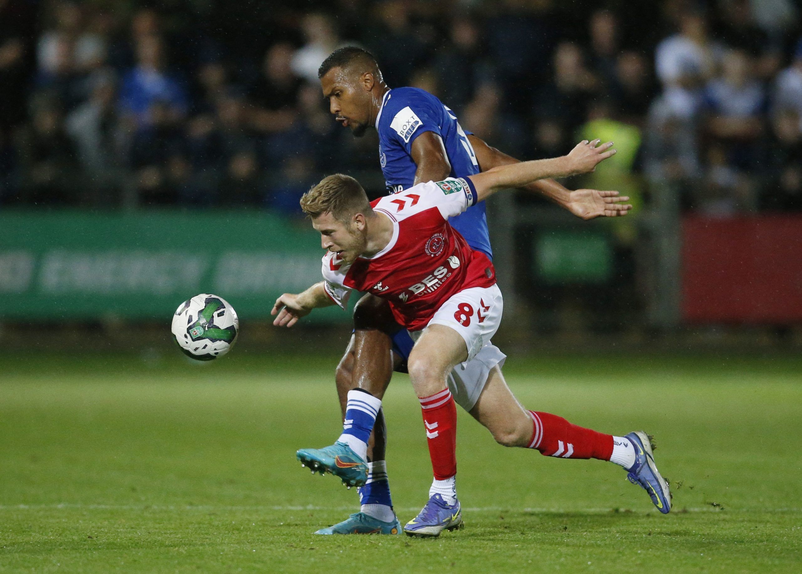Soccer Football - Carabao Cup Second Round - Fleetwood Town v Everton - Highbury Stadium, Fleetwood, Britain - August 23, 2022 Everton's Salomon Rondon in action with Fleetwood Town's Joshua Vela Action Images via Reuters/Ed Sykes EDITORIAL USE ONLY. No use with unauthorized audio, video, data, fixture lists, club/league logos or 'live' services. Online in-match use limited to 75 images, no video emulation. No use in betting, games or single club /league/player publications.  Please contact your