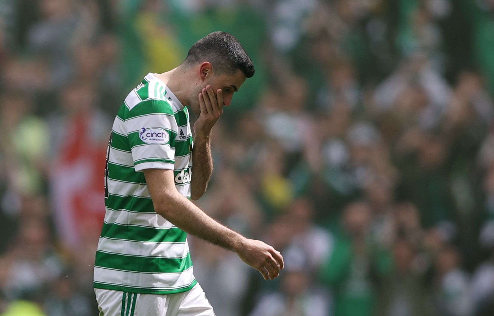 Soccer Football - Scottish Premiership - Celtic v Motherwell - Celtic Park, Glasgow, Scotland, Britain - May 14, 2022 Celtic's Tom Rogic looks emotional as is applauded off the pitch after being substituted Action Images via Reuters/Molly Darlington